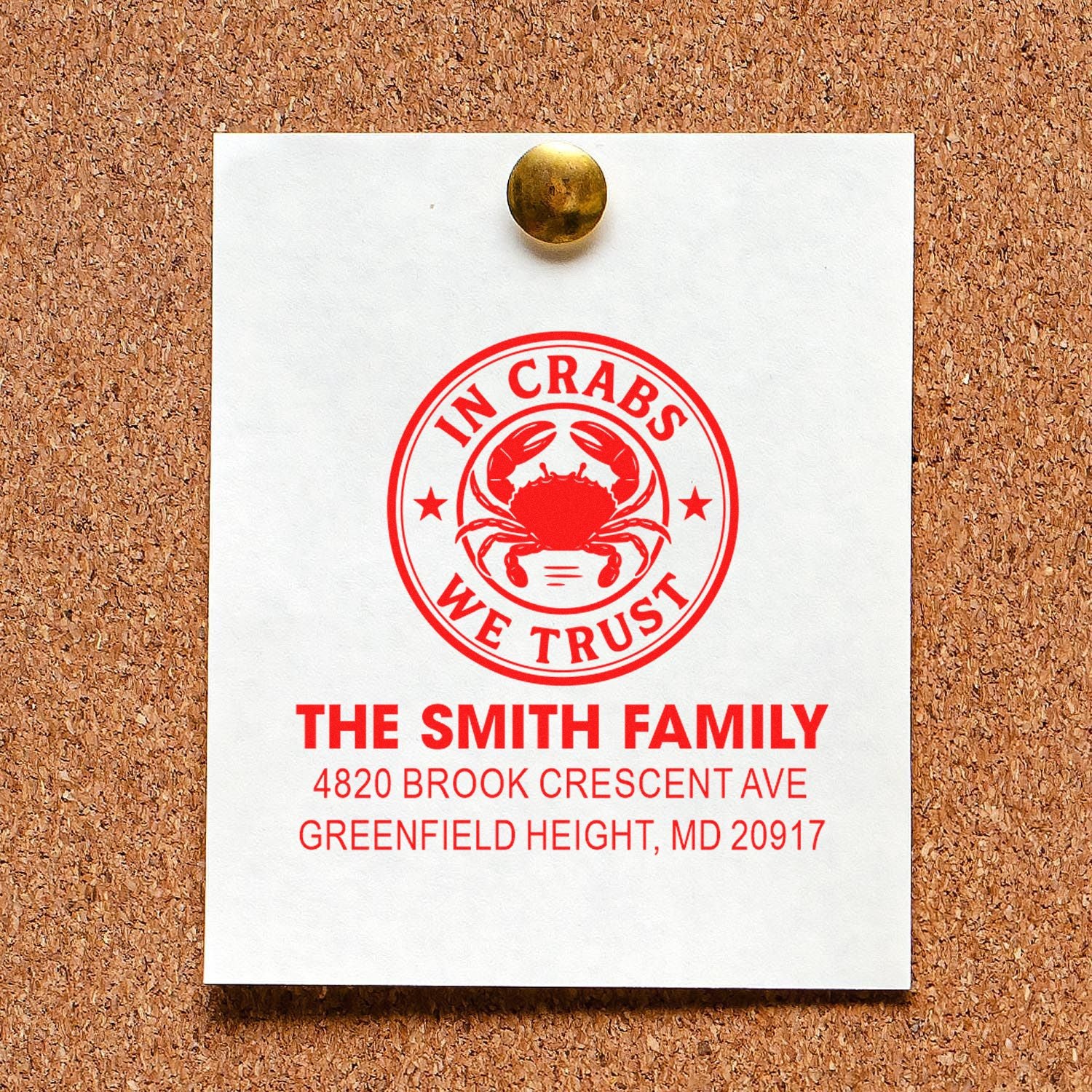 Custom rubber stamp for The Smith Family with crab logo, In Crabs We Trust design, and personalized return address.