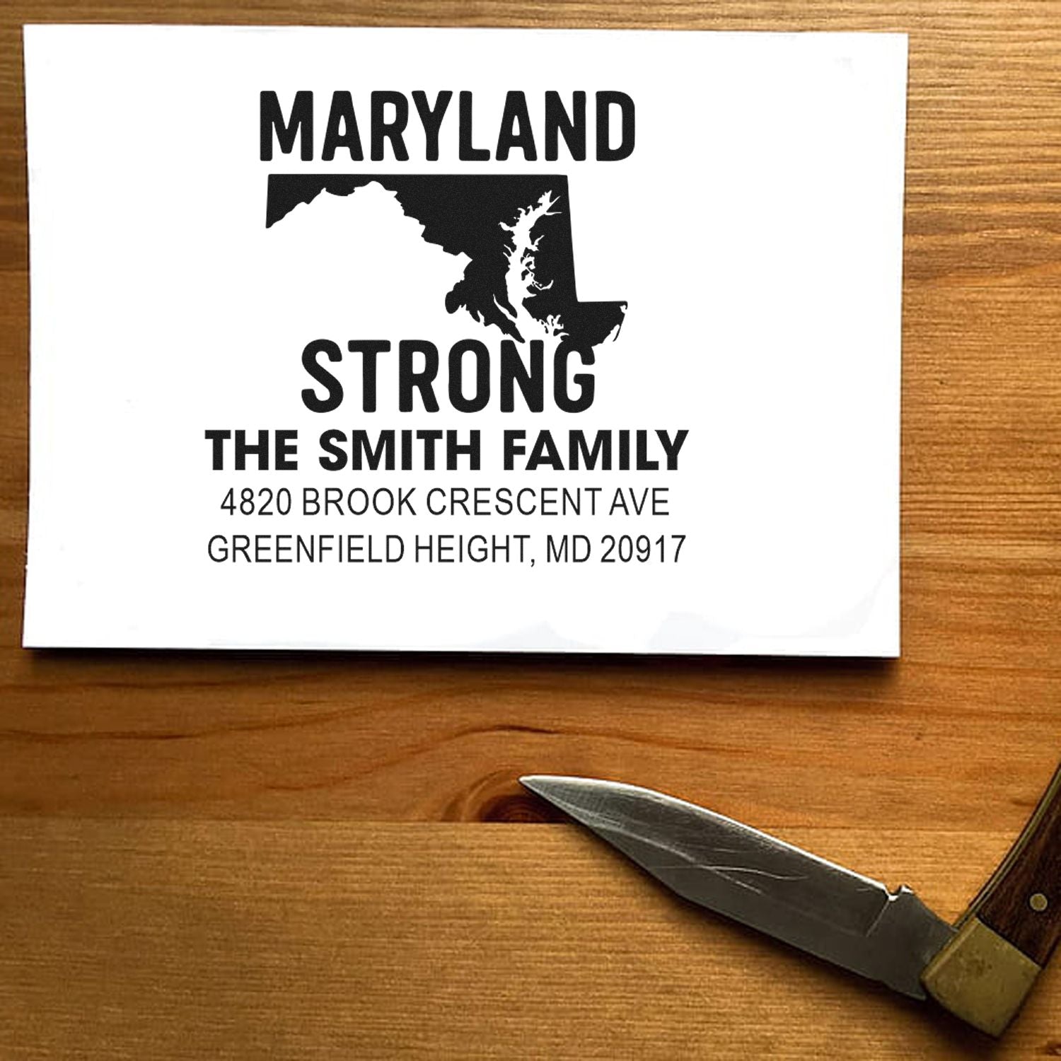 Custom Maryland family address rubber stamp with state silhouette, personalized for The Smith Family, Greenfield Height, MD 20917.