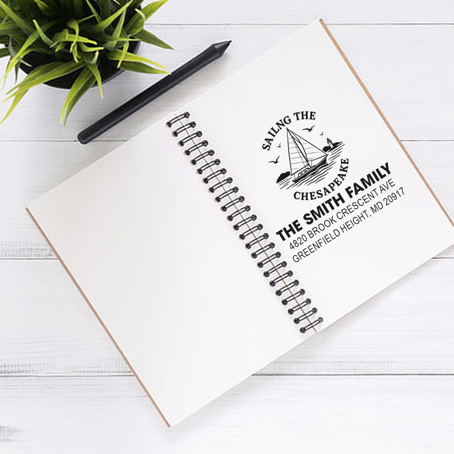 Custom return address rubber stamp with sailboat logo for The Smith Family, Chesapeake, MD