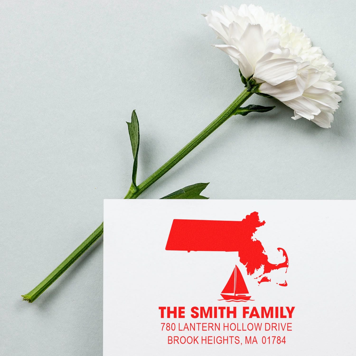 Personalized return address rubber stamp with Massachusetts silhouette and sailboat for Smith family envelopes and cards.