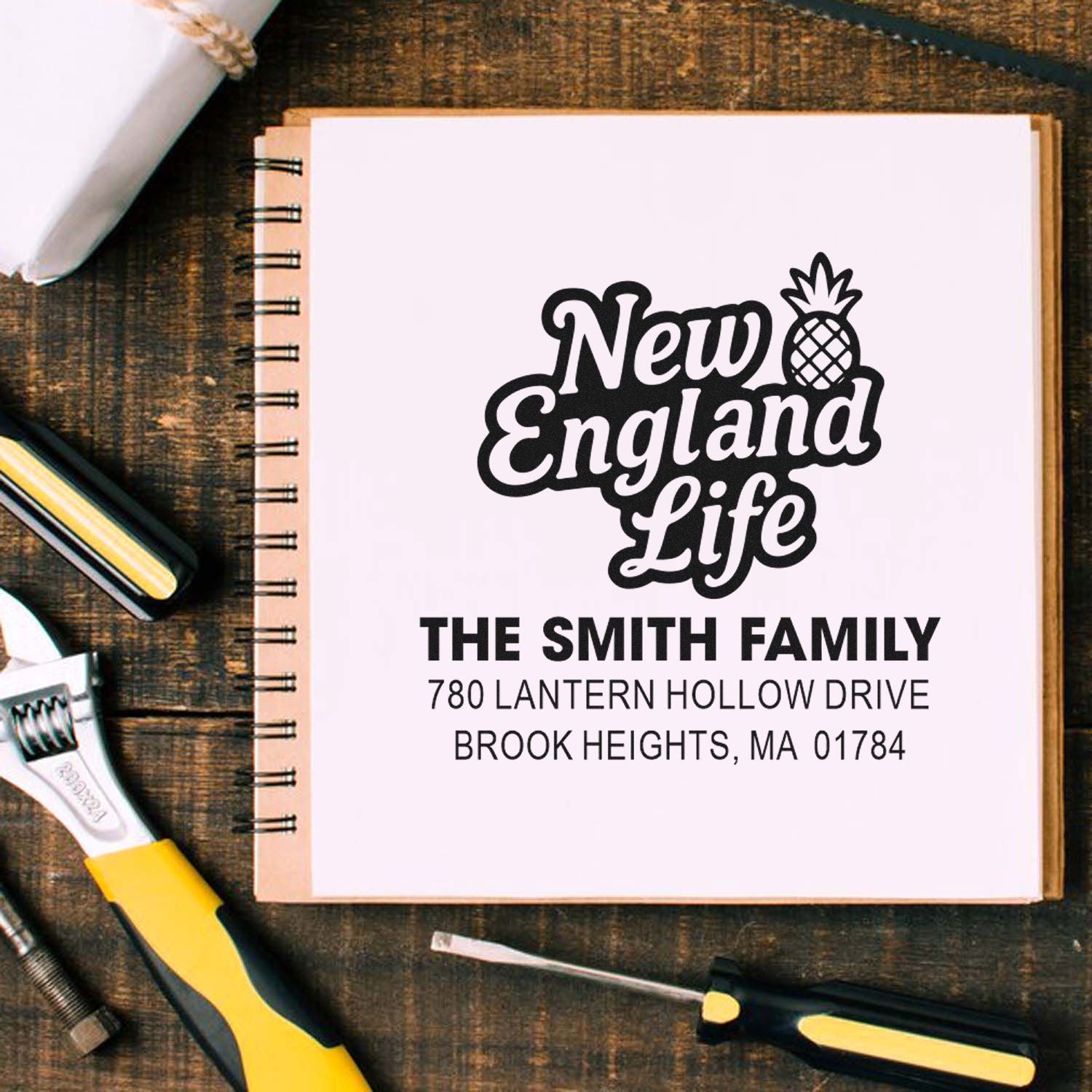 Custom rubber return address stamp for The Smith Family featuring New England Life logo and Brook Heights, MA address