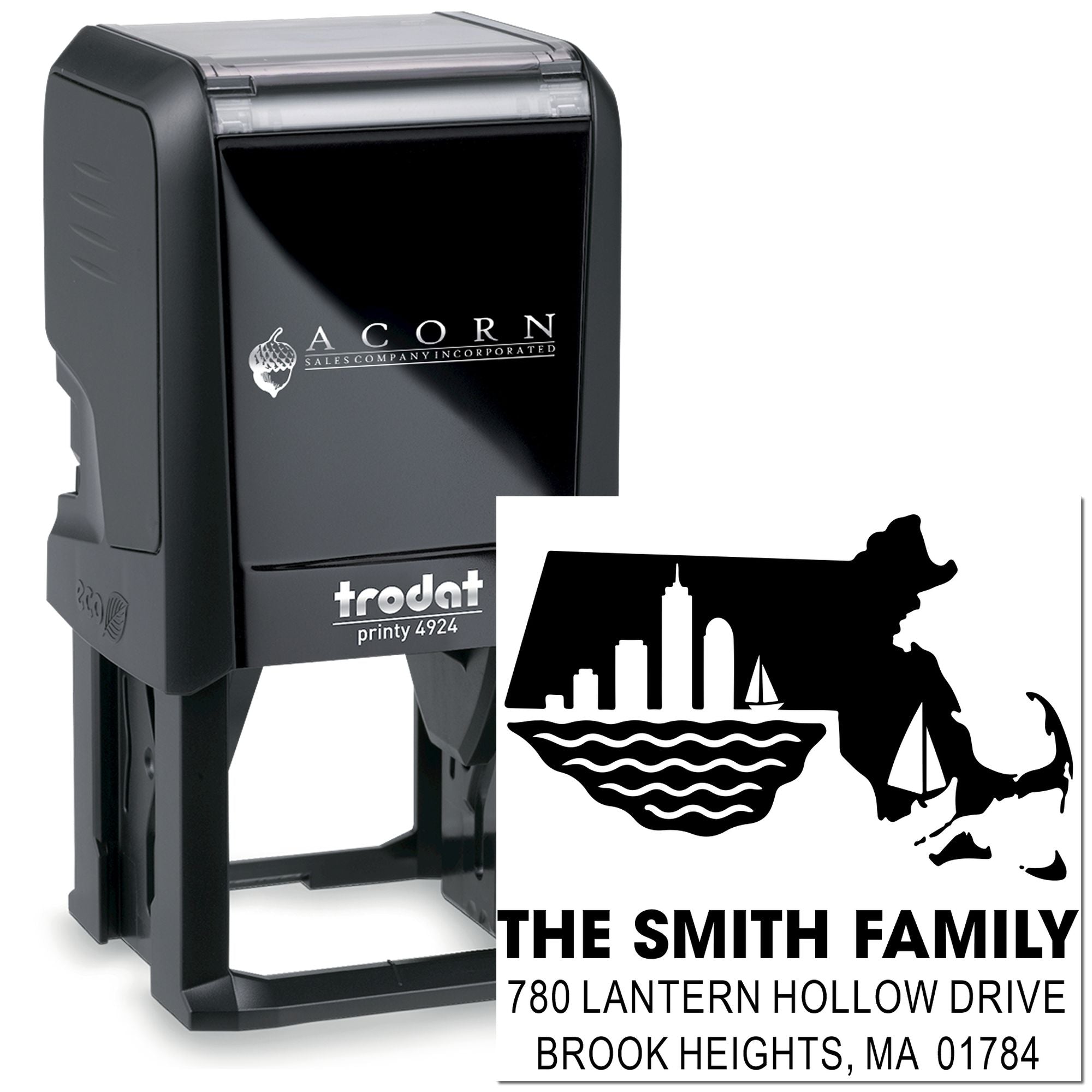 Custom self-inking Trodat Printy 4924 address rubber stamp with family name, return address, and skyline design.