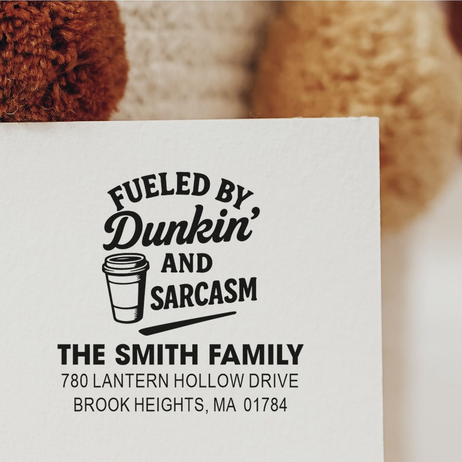 Custom rubber stamp imprint for The Smith Family reading Fueled by Dunkin and sarcasm with return address.