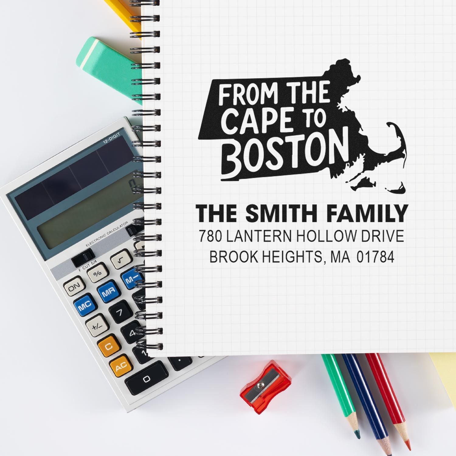 Custom rubber address stamp with Massachusetts silhouette and return address for The Smith Family, ideal for mailing and branding.