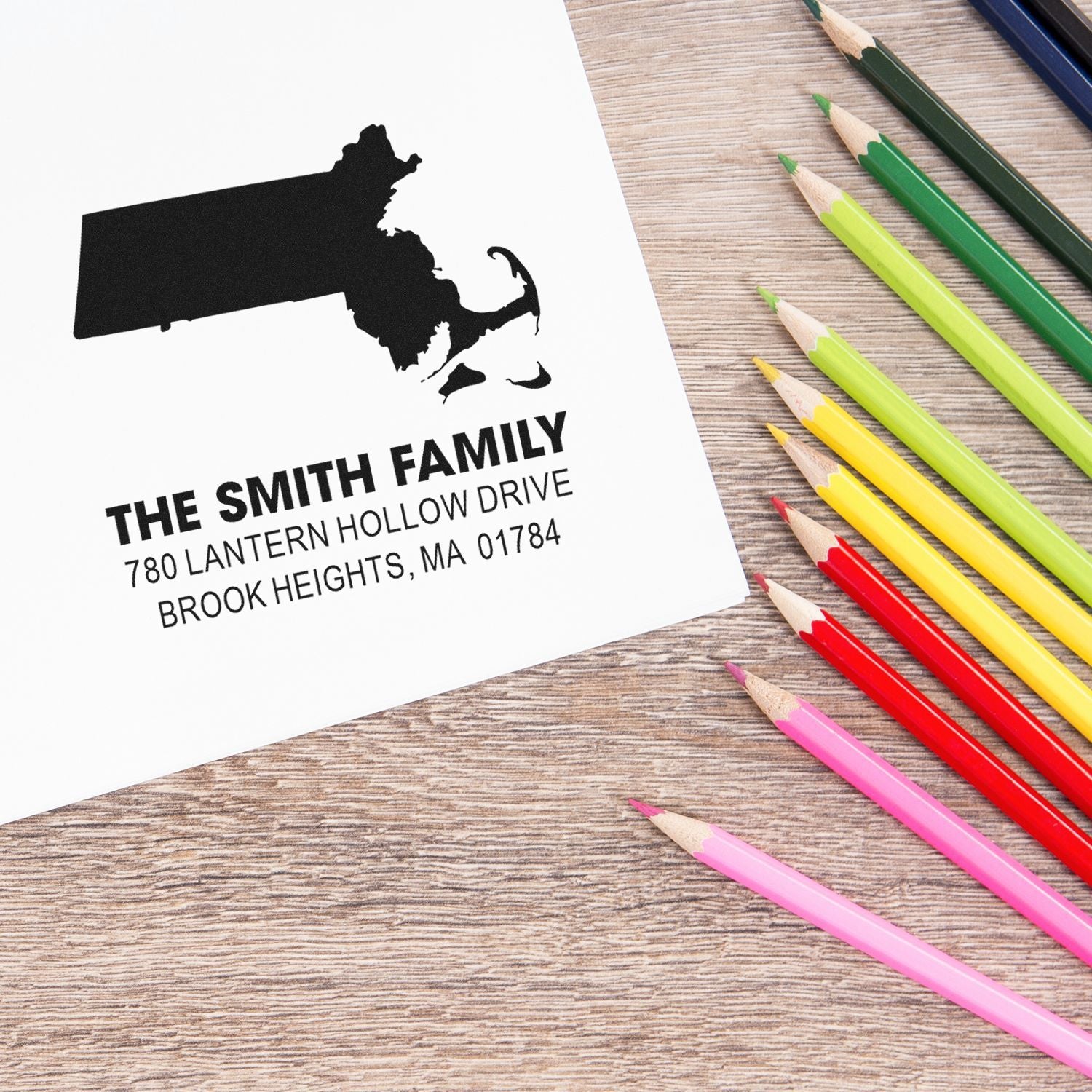 Custom return address rubber stamp with Massachusetts state design for The Smith Family mail and stationery.