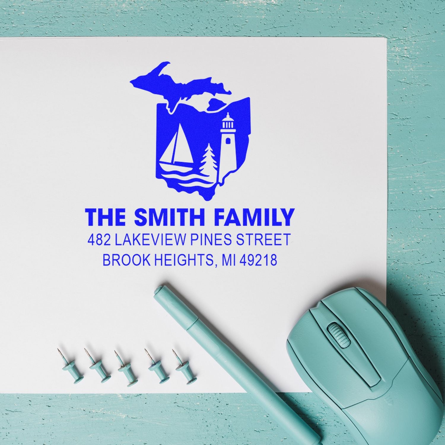 Custom rubber return address stamp for The Smith Family, featuring Michigan lakeside artwork and Brook Heights, MI address.