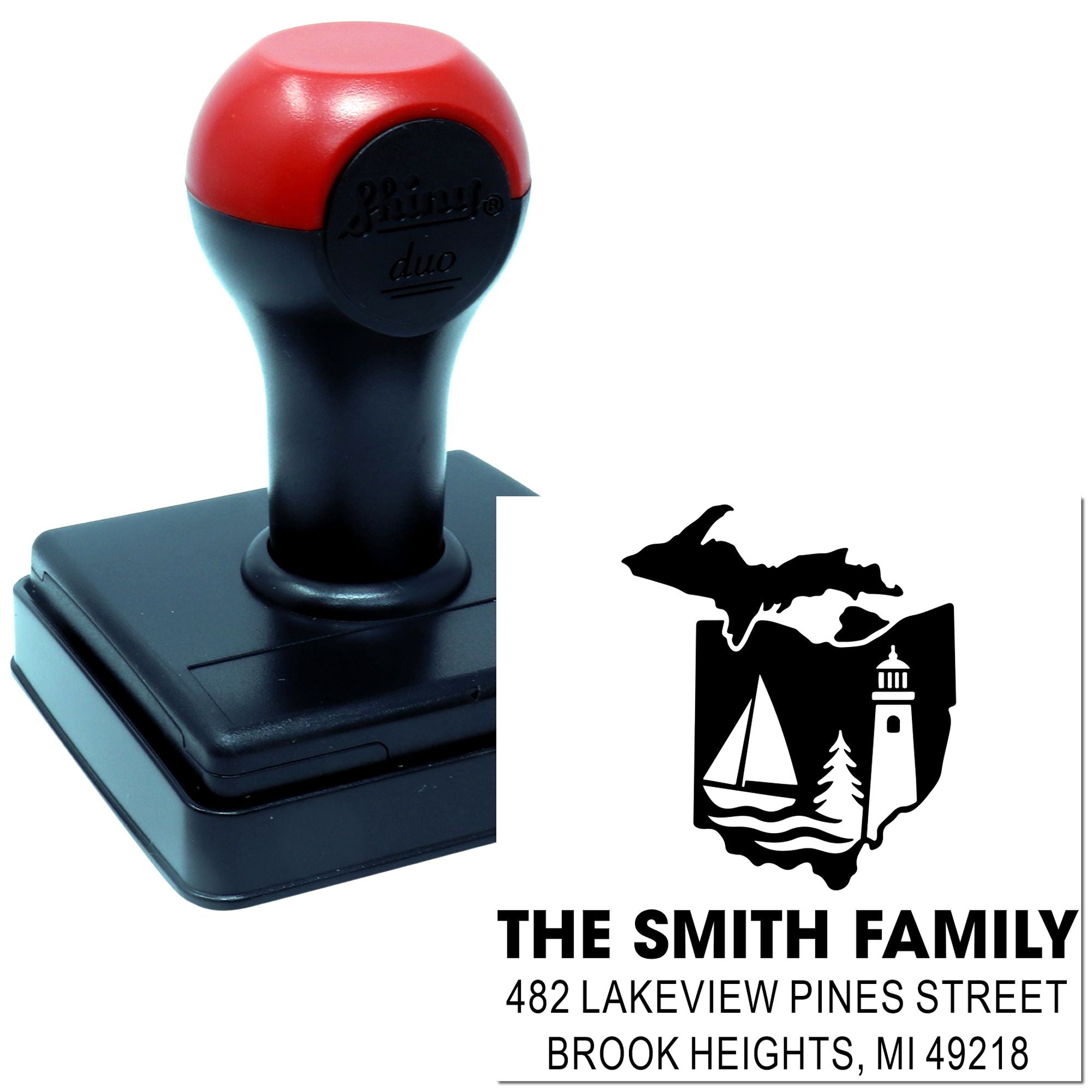 Custom self-inking rubber stamp for a Michigan family return address with lake, lighthouse, and sailboat design.