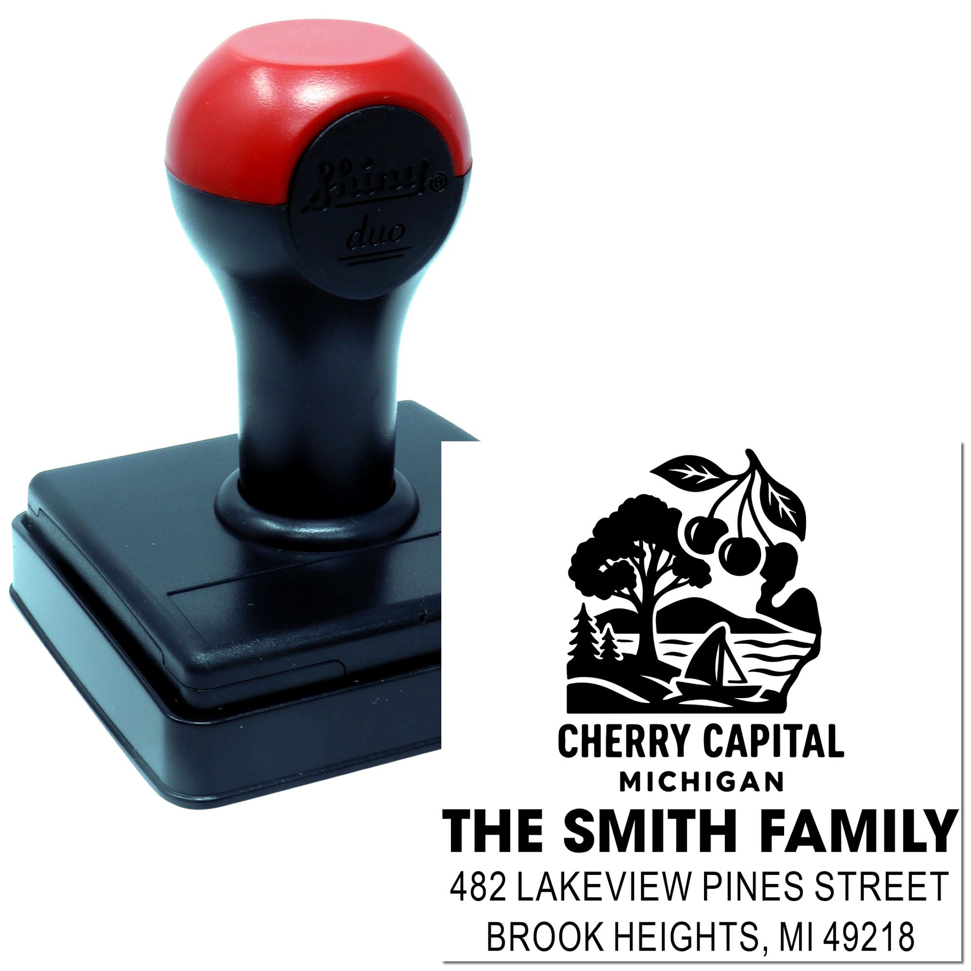 Custom self-inking rubber address stamp with Cherry Capital Michigan family return address design.