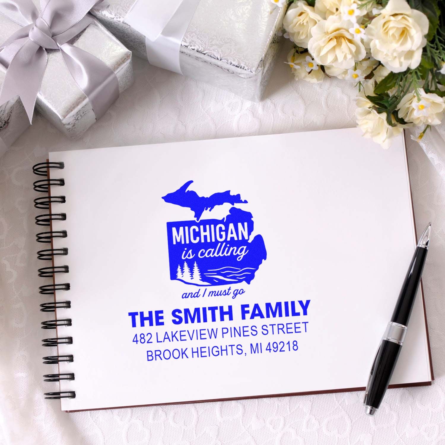 Personalized Michigan return address rubber stamp with family name, address, and state silhouette design.