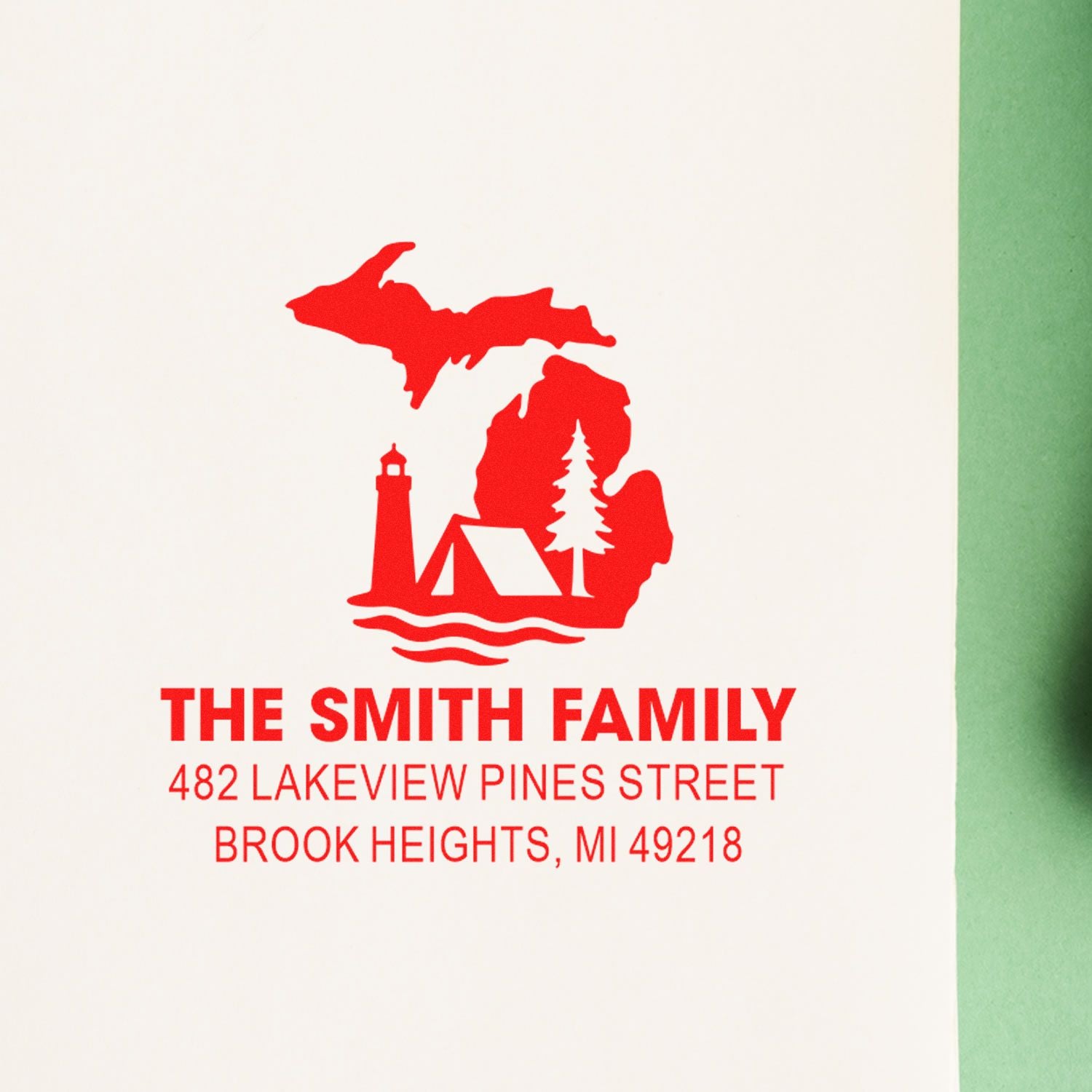 Custom family return address rubber stamp with Michigan lighthouse design for The Smith Family, Brook Heights, MI 49218.