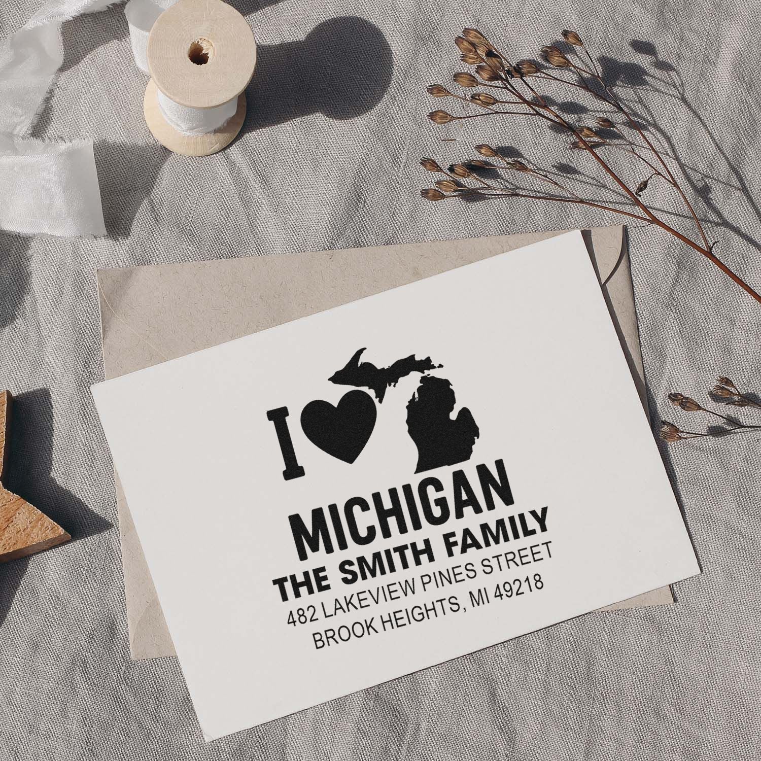 Custom rubber stamp return address design with I Love Michigan, The Smith Family, and Brook Heights, MI 49218.