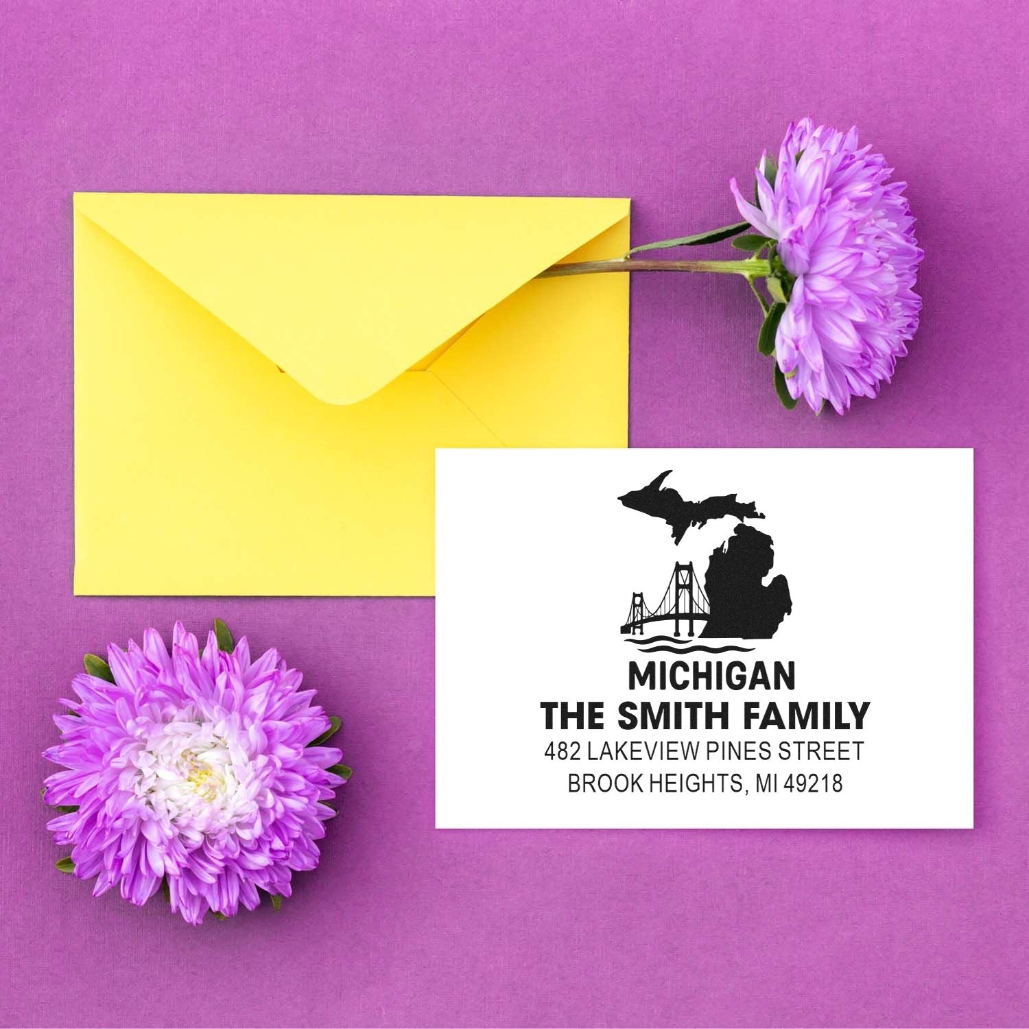 Custom Michigan address rubber stamp for The Smith Family, shown as a return address stamp mockup with envelope.