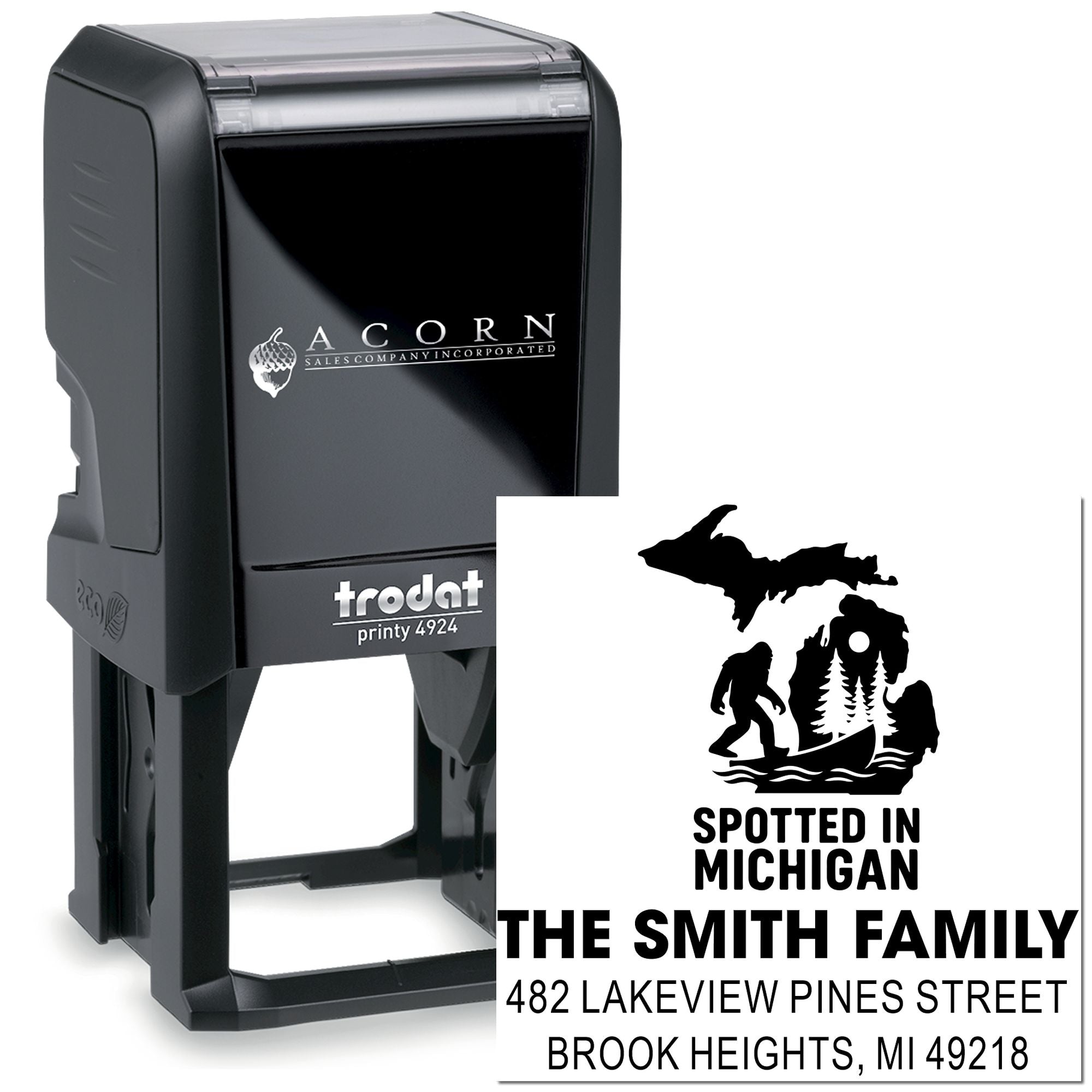 Custom self-inking rubber address stamp with Michigan family design and personalized return address.
