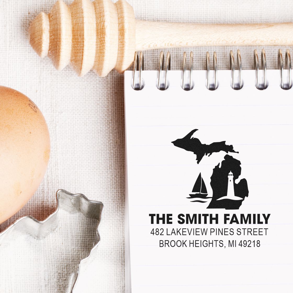Custom Michigan return address rubber stamp for The Smith Family with lighthouse and sailboat design.