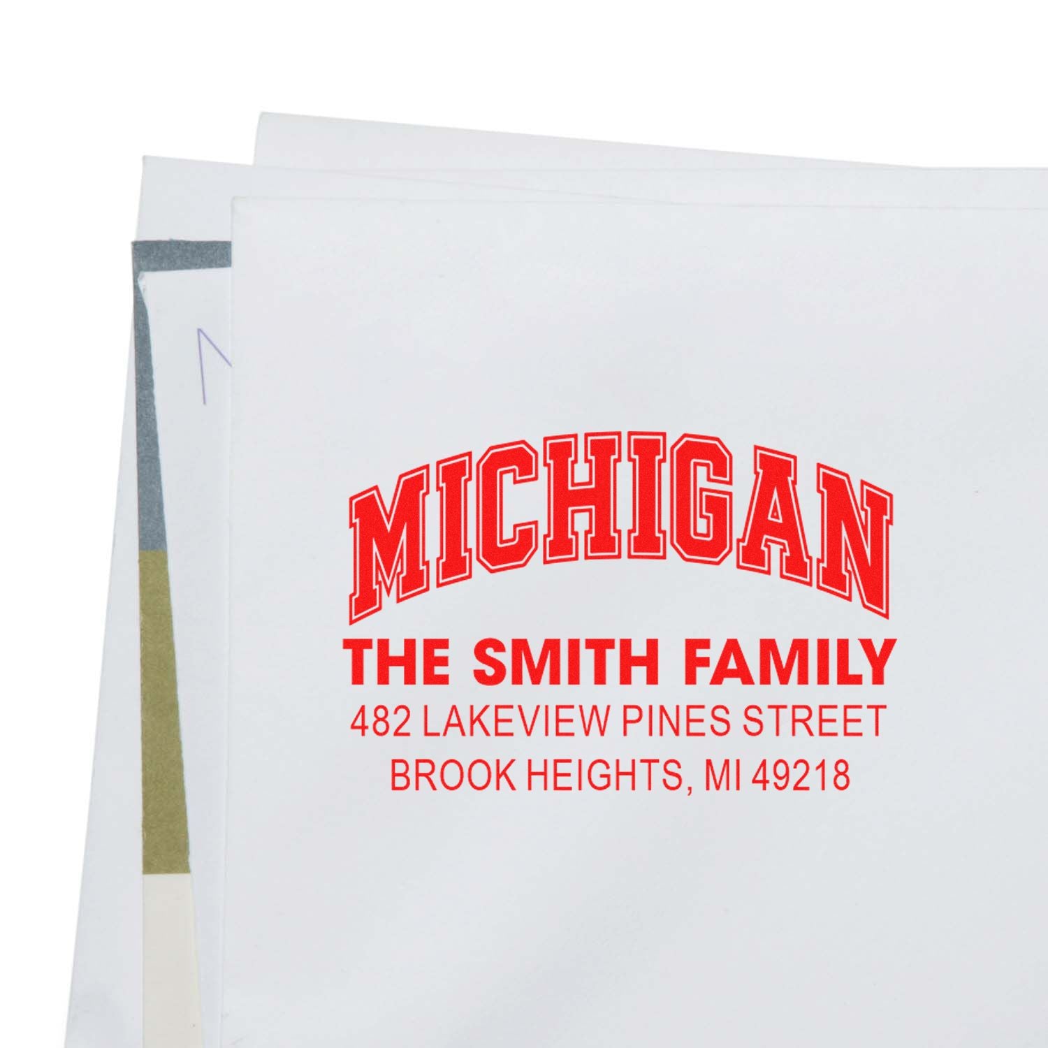 Custom Michigan return address rubber stamp for The Smith Family with personalized home address.