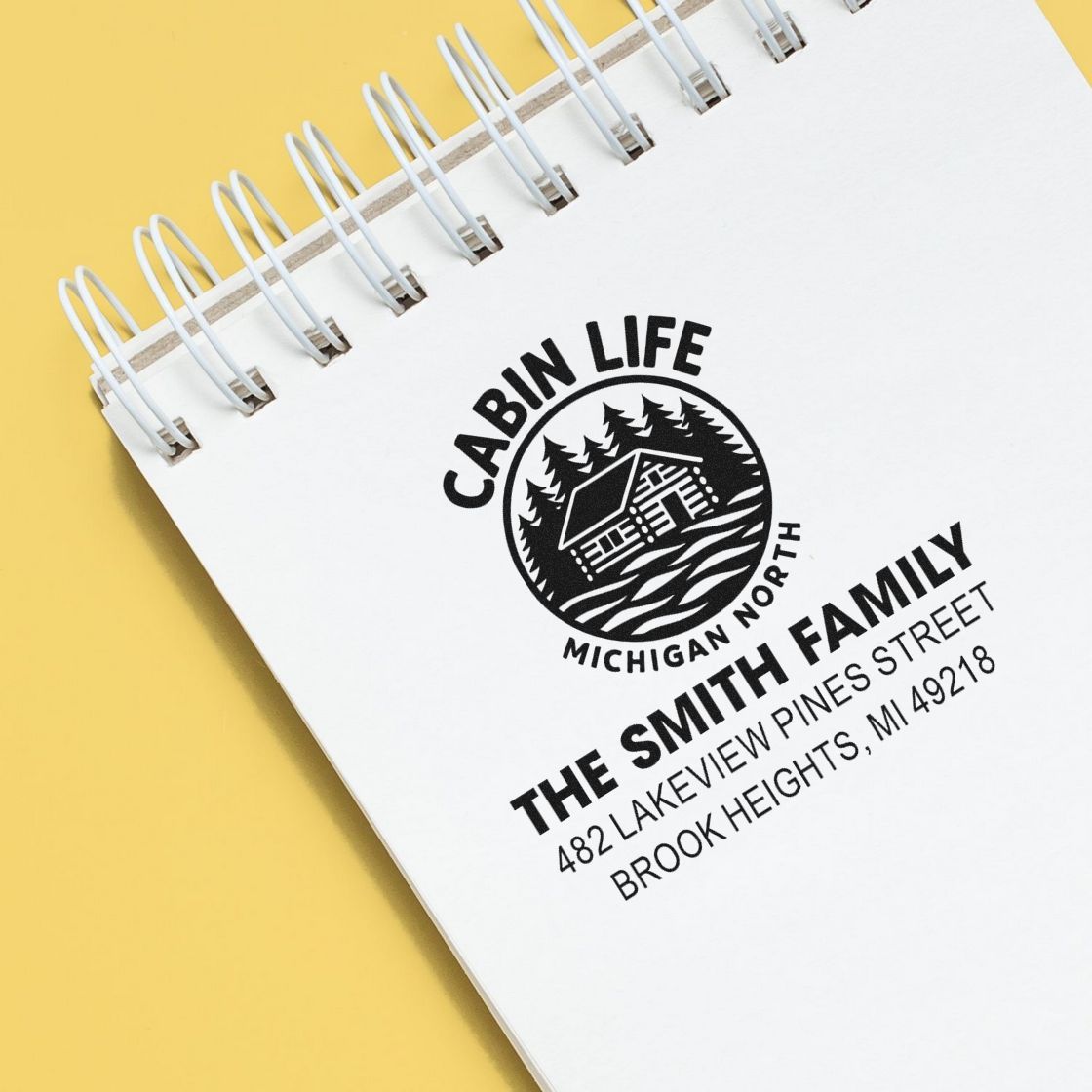 Custom rubber stamp for a family cabin address, featuring Cabin Life Michigan North and The Smith Family in a logo design.