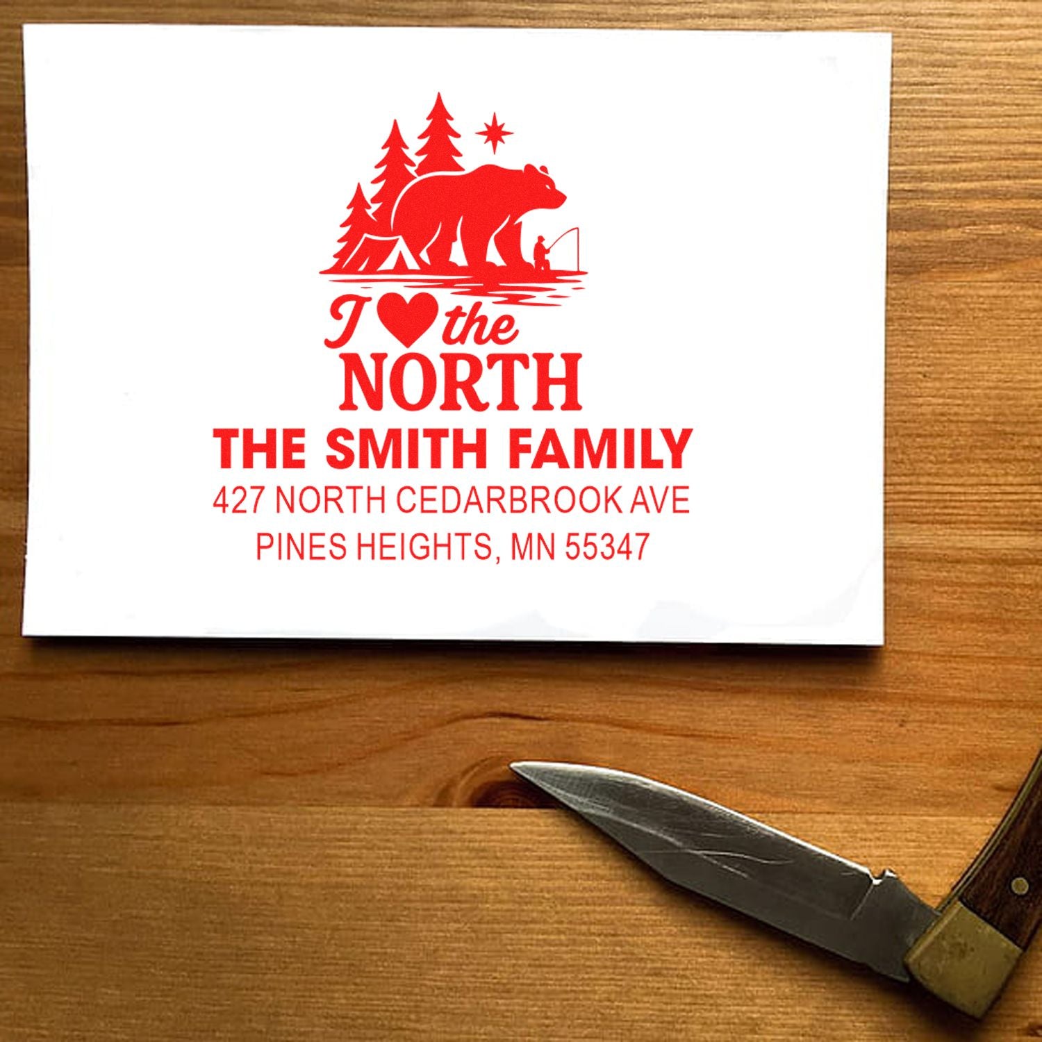 Personalized family return address rubber stamp with bear and forest design, featuring I Love the North for The Smith Family in Pines Heights, MN.
