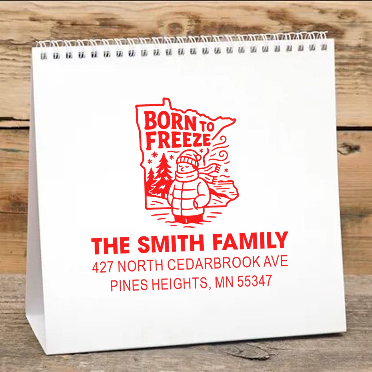 Personalized winter address rubber stamp with family name, home address, and Born to Freeze snowman design.