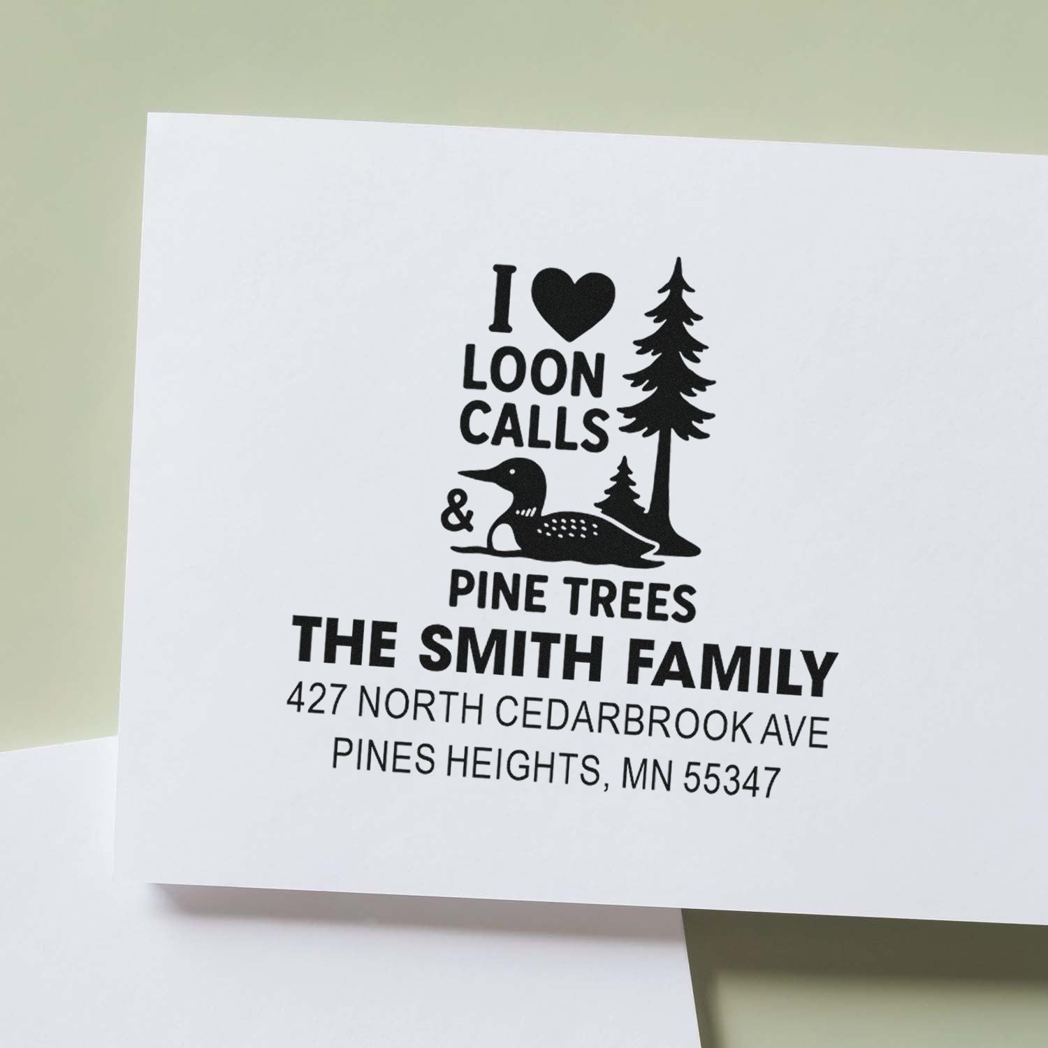 Custom family address rubber stamp with loon and pine tree design for The Smith Family, Pines Heights, MN