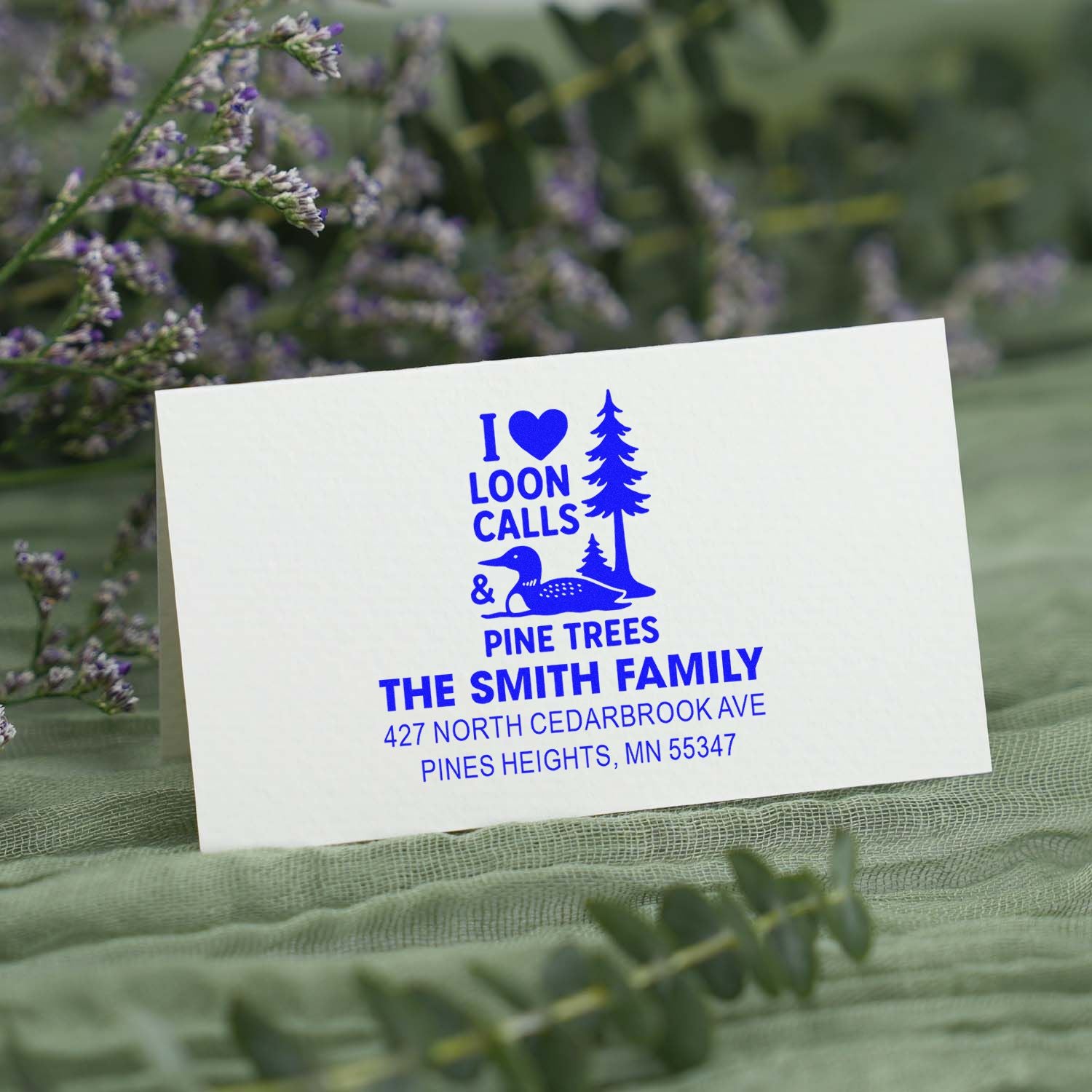 Personalized rubber return address stamp with loon and pine tree design for The Smith Family mailing needs.