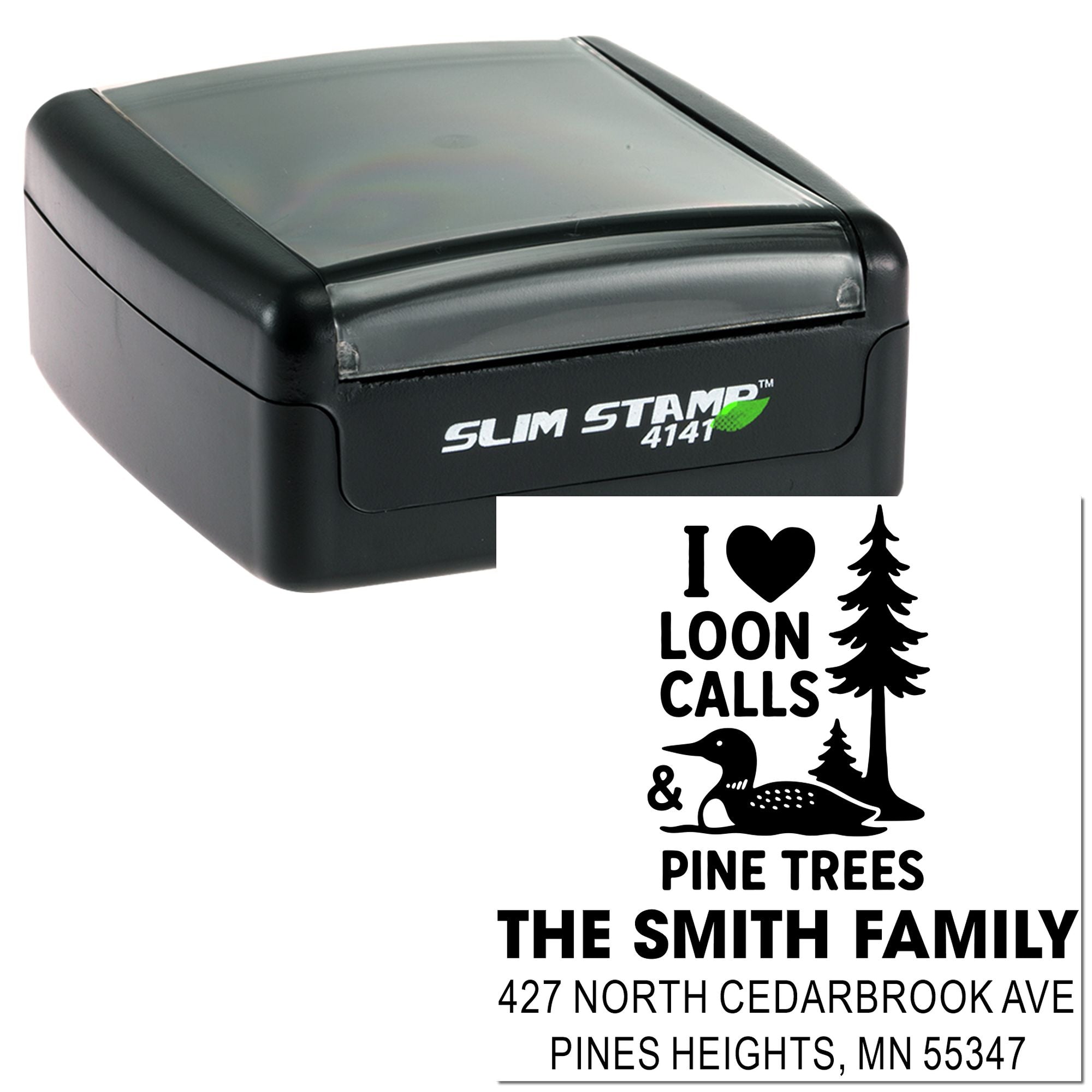 Custom self-inking rubber stamp with loon and pine tree design for The Smith Family address and nature-themed mailing.