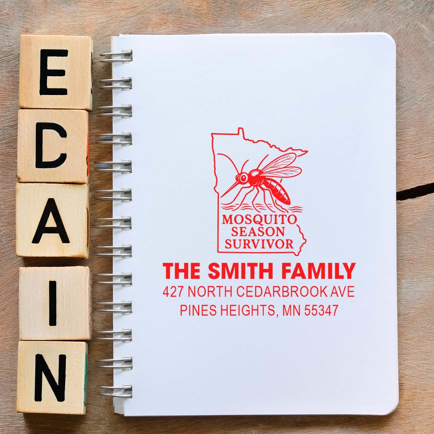Custom rubber address stamp proof with mosquito season survivor design for The Smith Family, Minnesota.