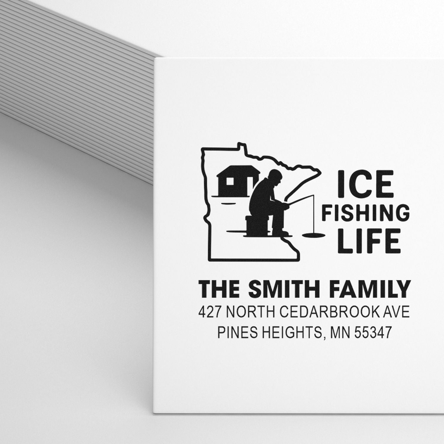 Personalized rubber stamp design for ice fishing lovers with Minnesota outline, family name, and return address.