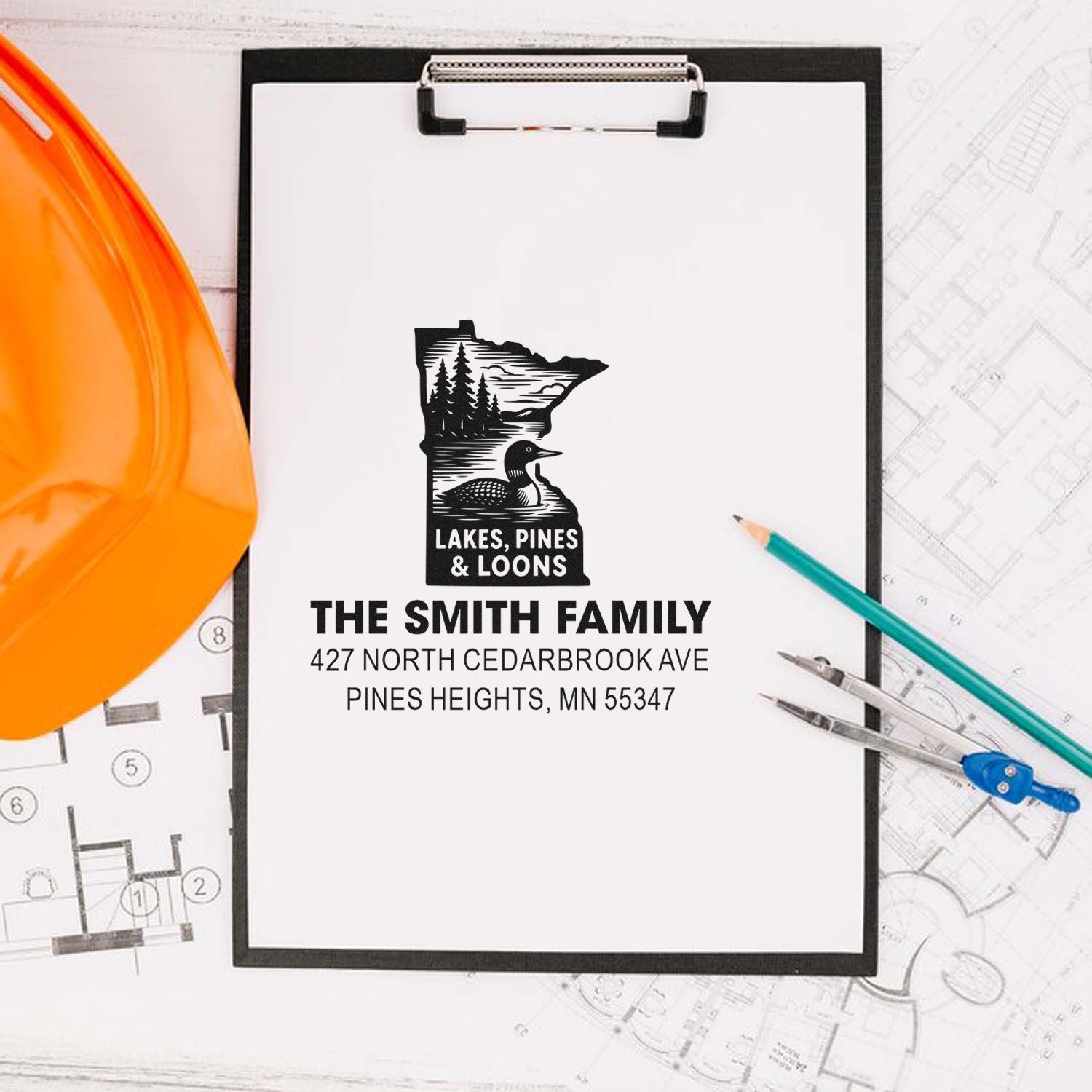Personalized custom address rubber stamp with Minnesota lakes, pines and loons design for the Smith family.
