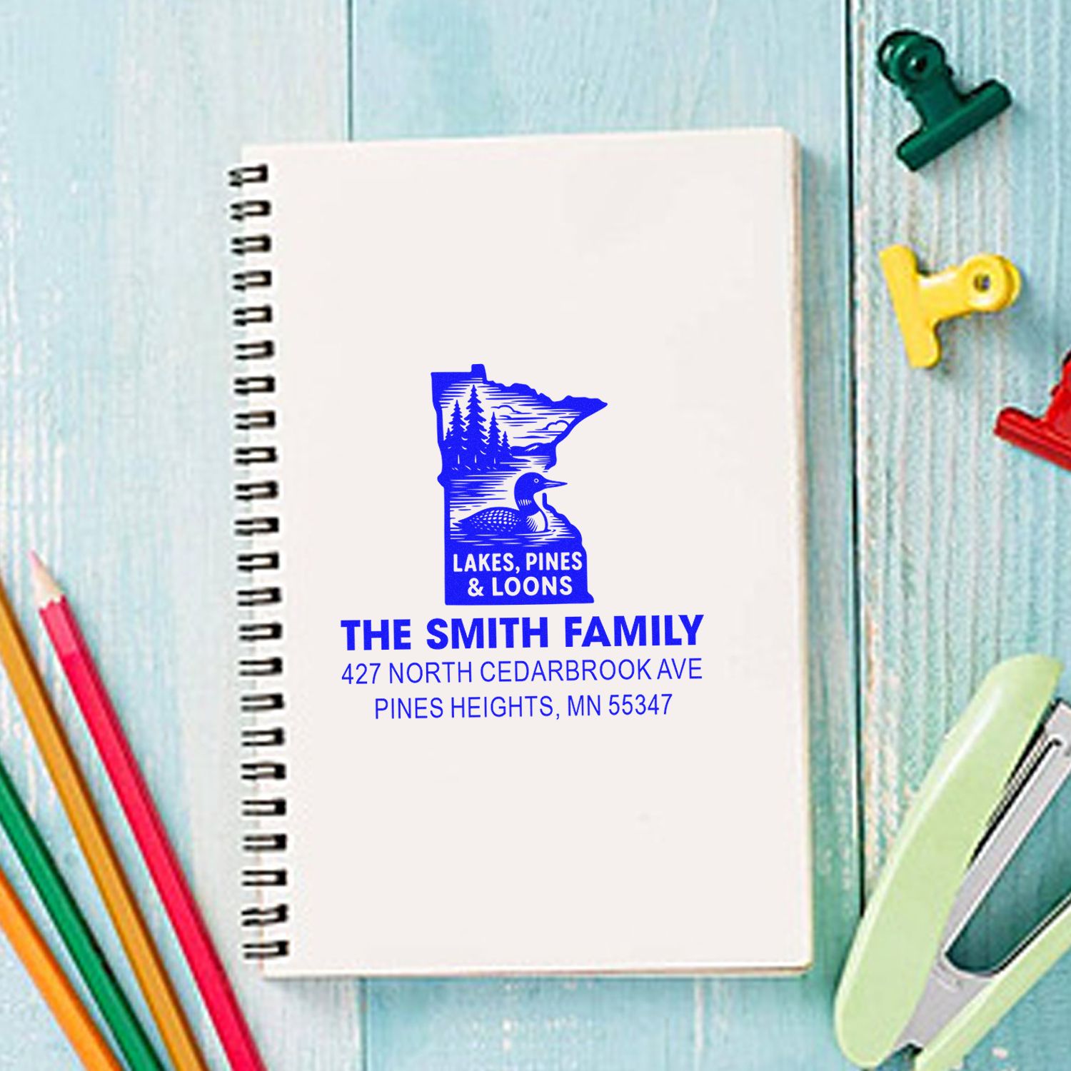 Custom Minnesota return address rubber stamp for family stationery with lakes, pines and loons artwork