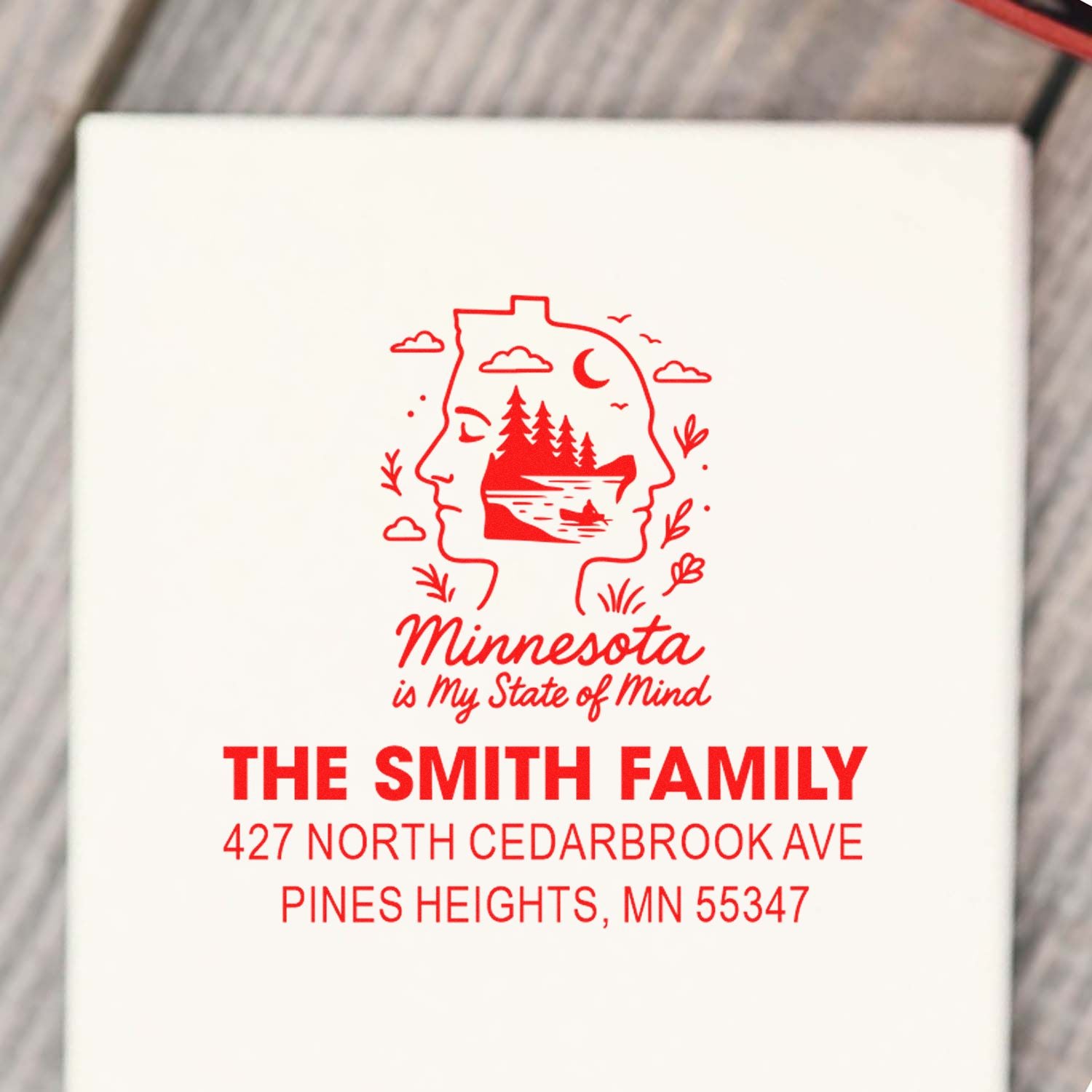 Custom Minnesota return address rubber stamp with state map design and personalized family name and address.
