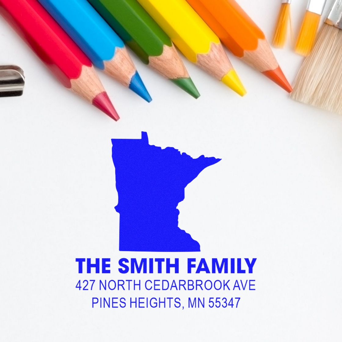 Custom return address rubber stamp with Minnesota silhouette for The Smith Family, 427 North Cedarbrook Ave, Pines Heights, MN.
