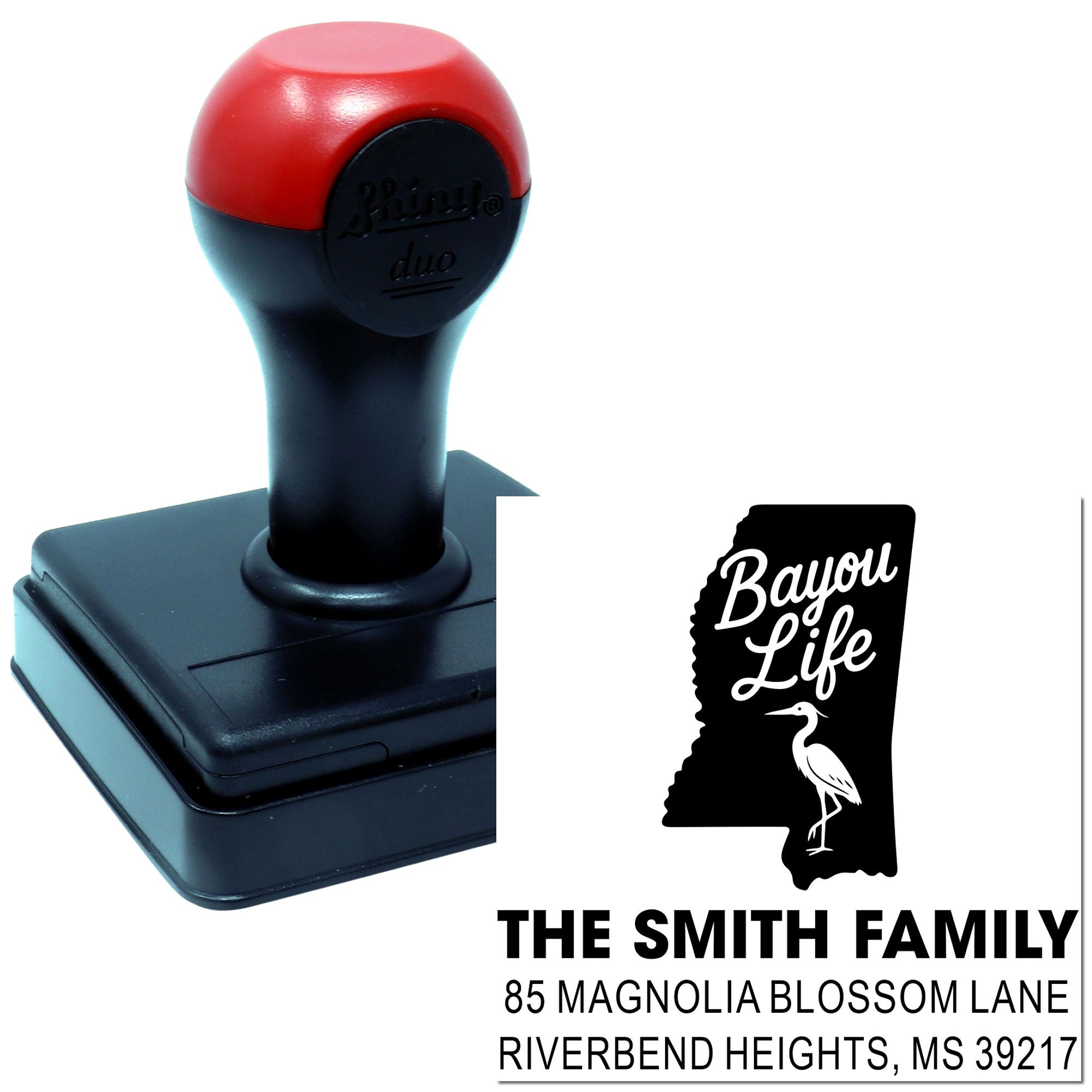 Custom self-inking address rubber stamp with Bayou Life Mississippi design and Smith family return address for mailing.