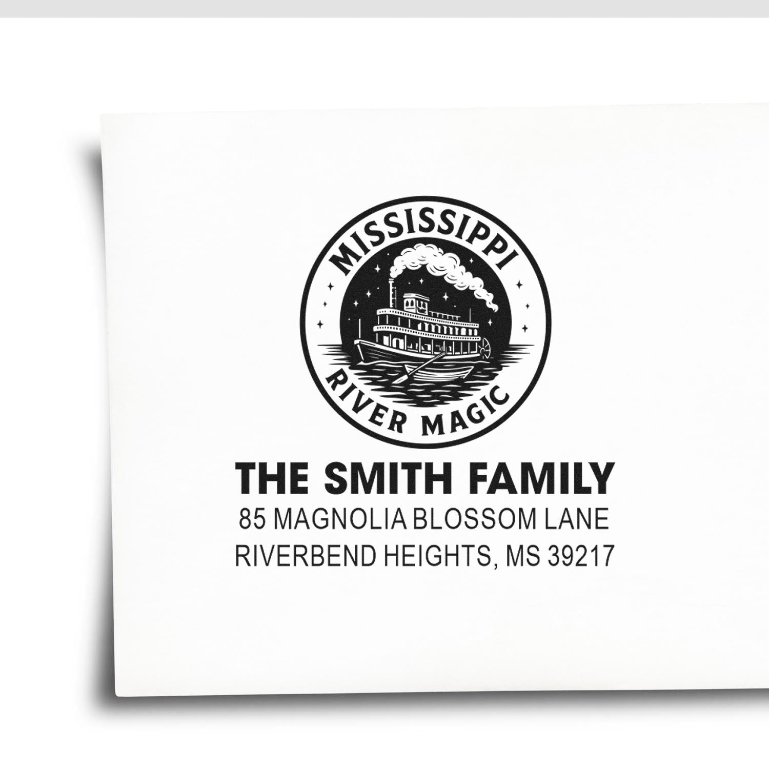 Custom family address rubber stamp with Mississippi River Magic boat logo for The Smith Family, Riverbend Heights, MS.
