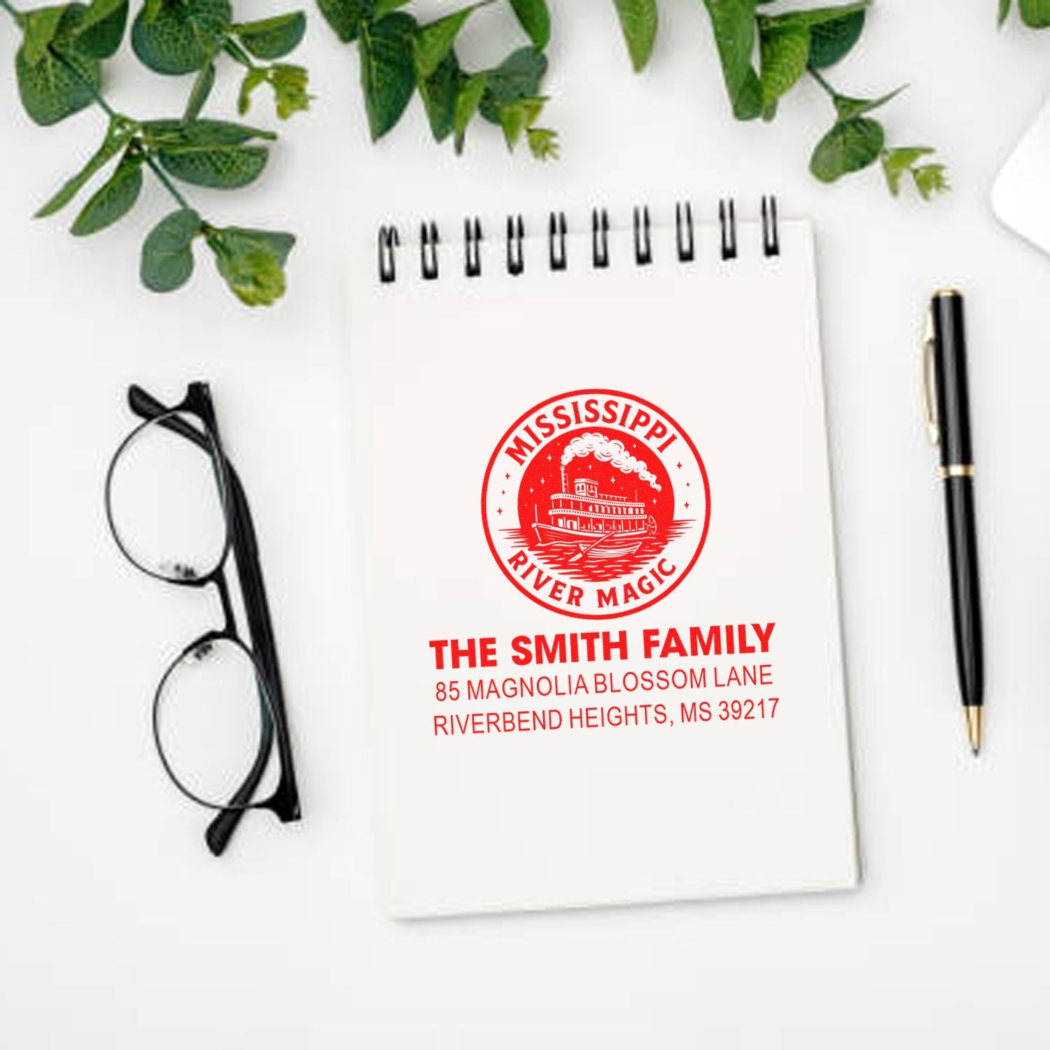 Custom Mississippi address rubber stamp with family name, perfect for personalized mailing and stationery.
