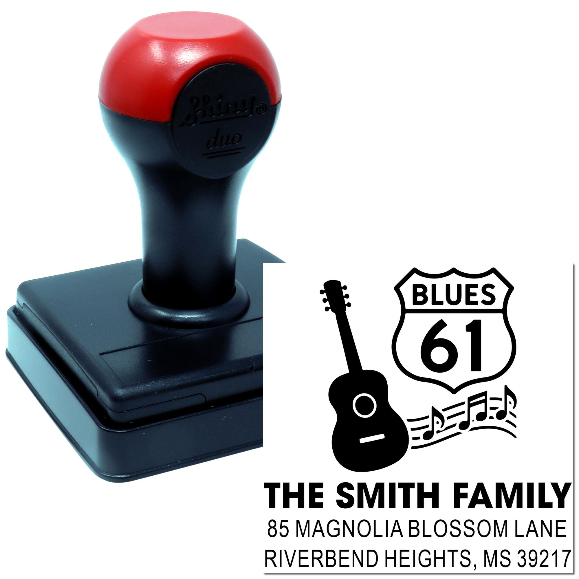 Custom self-inking rubber stamp with blues guitar design, family name, and return address for personalized mail.