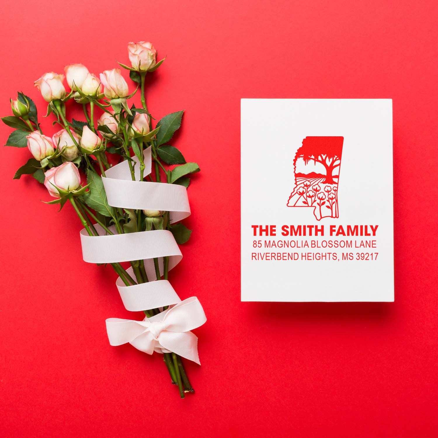 Custom rubber stamp with Mississippi state design and The Smith Family address, styled with roses for personalized wedding or gift branding.