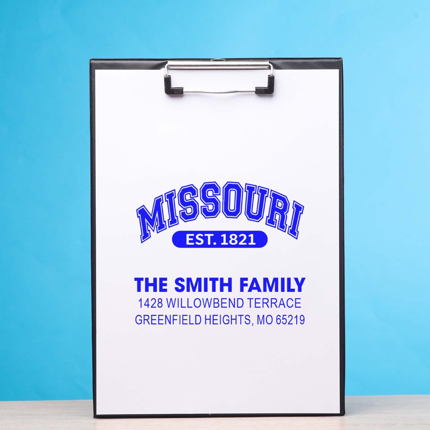 Custom rubber address stamp design featuring Missouri, The Smith Family, and a full return address for personalized mailing.