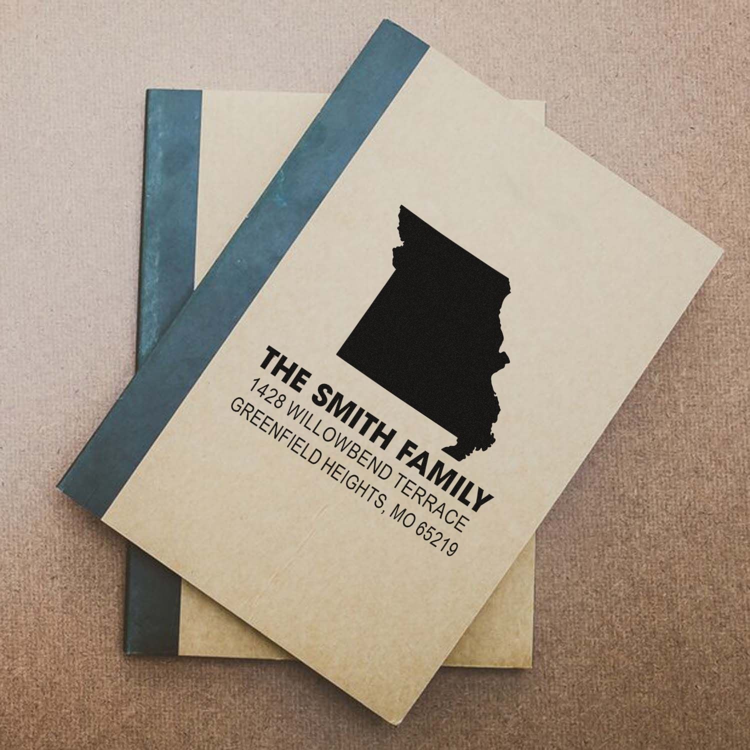 Custom family return address rubber stamp with Missouri state silhouette for The Smith Family, ideal for envelopes and stationery.