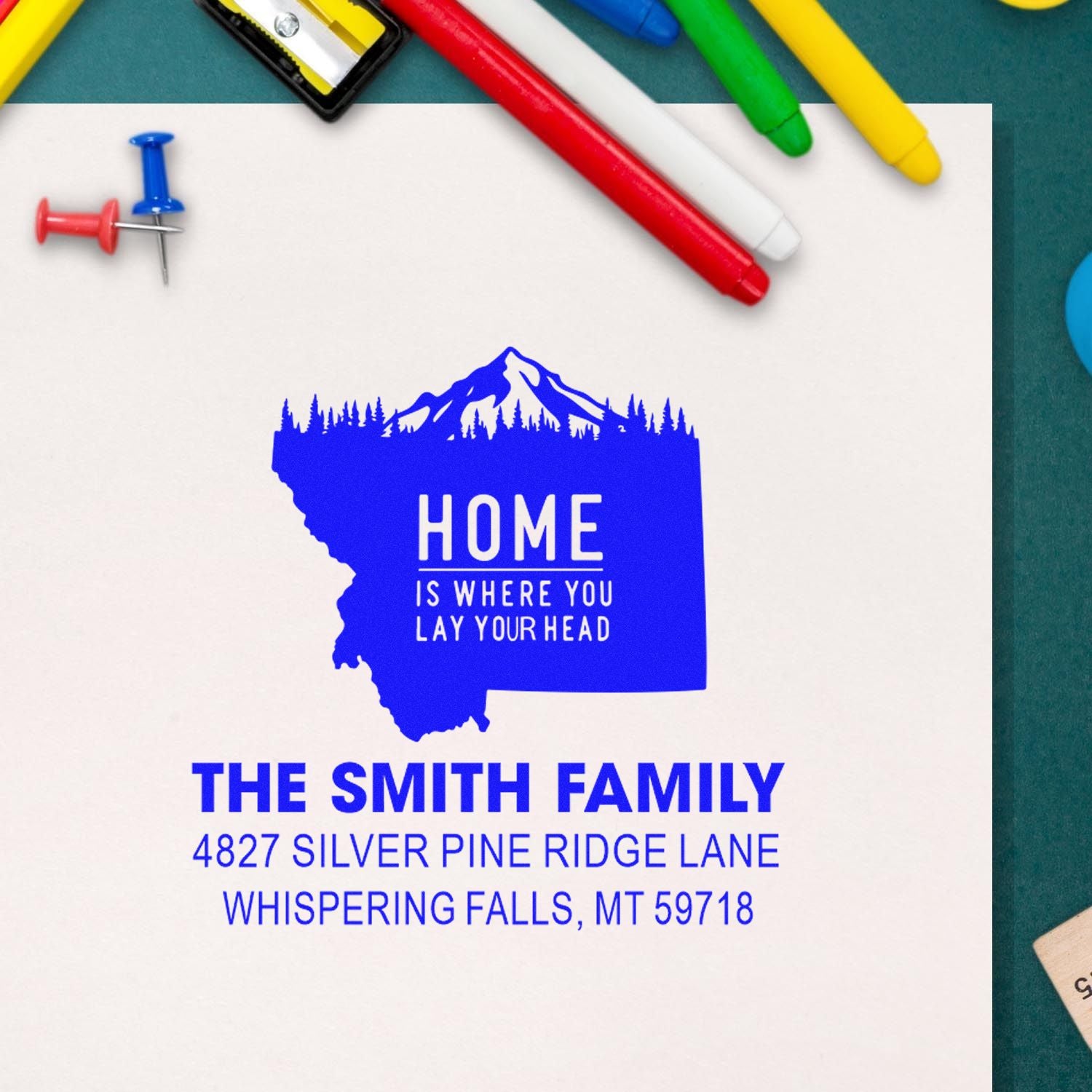 Custom Montana return address rubber stamp for The Smith Family, featuring a mountain home design.