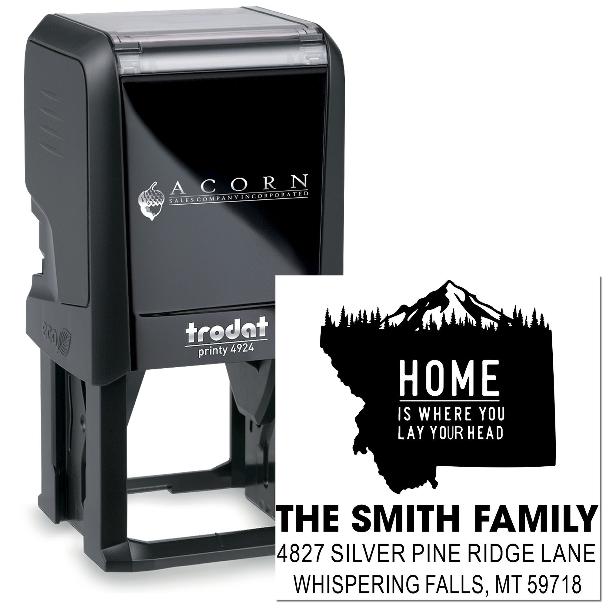 Custom self-inking rubber address stamp with mountain home design and personalized family name and address imprint.