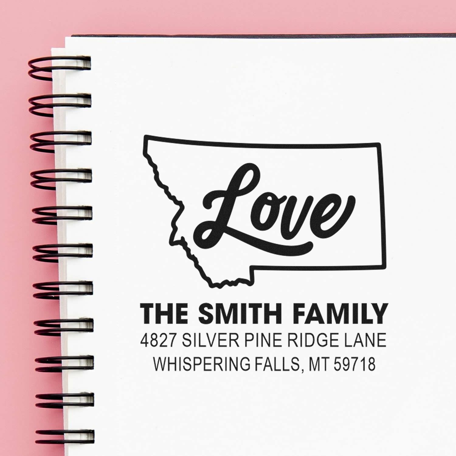 Personalized Montana family address rubber stamp with Love design, showing The Smith Family in Whispering Falls, MT.
