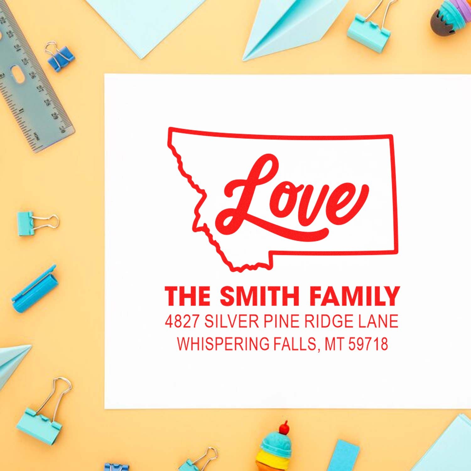 Custom Montana love rubber stamp with family name and address for personalized envelopes, cards, and wedding stationery.