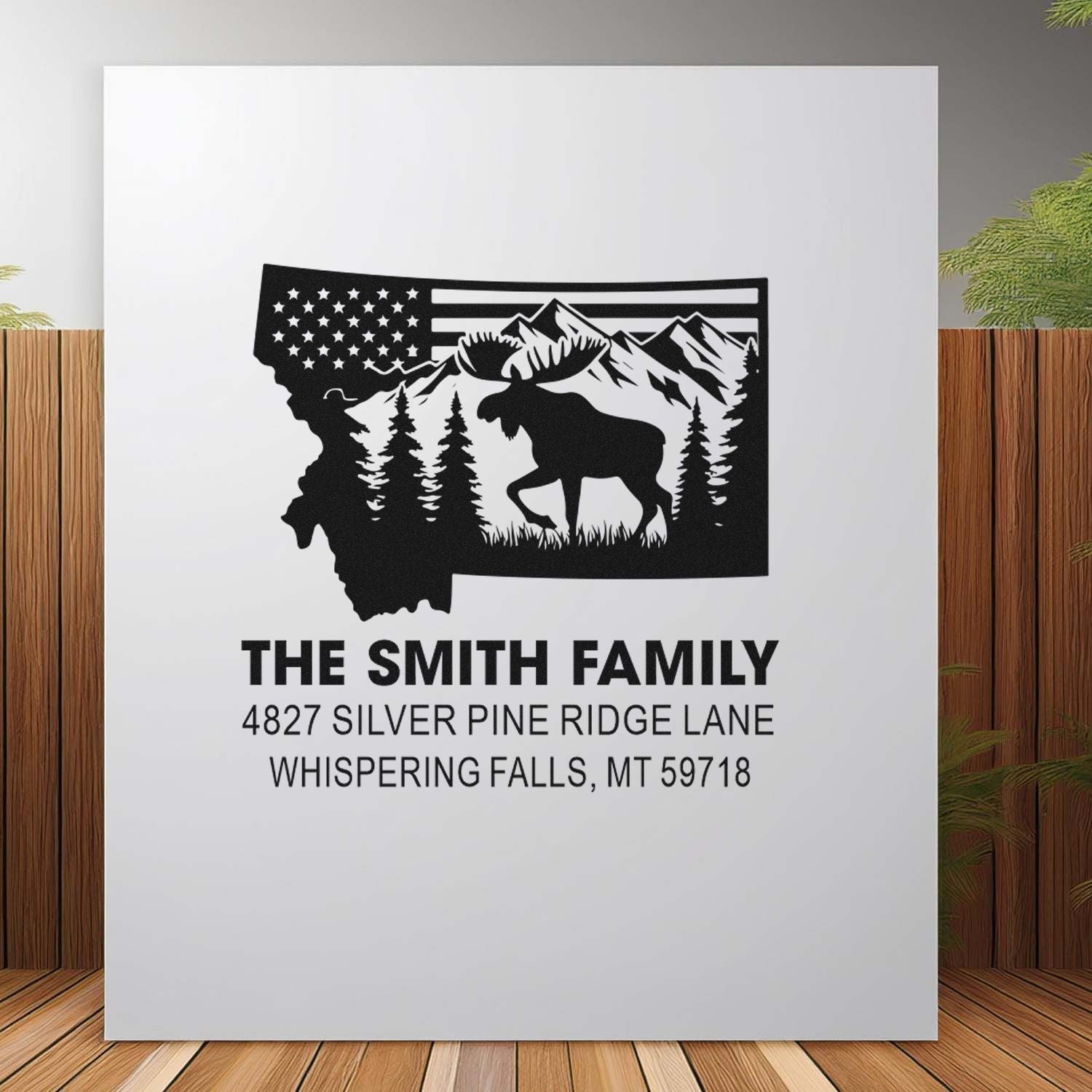 Personalized rubber stamp with Montana moose, mountains and U.S. flag, featuring The Smith Family return address.