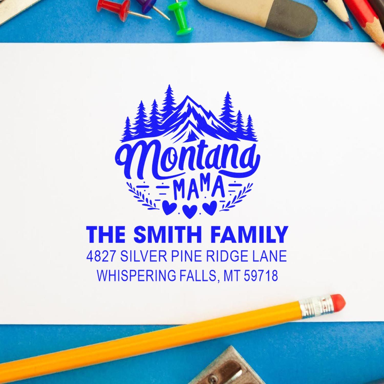 Custom Montana Mama return address rubber stamp for The Smith Family, with mountain logo and Whispering Falls, MT address.