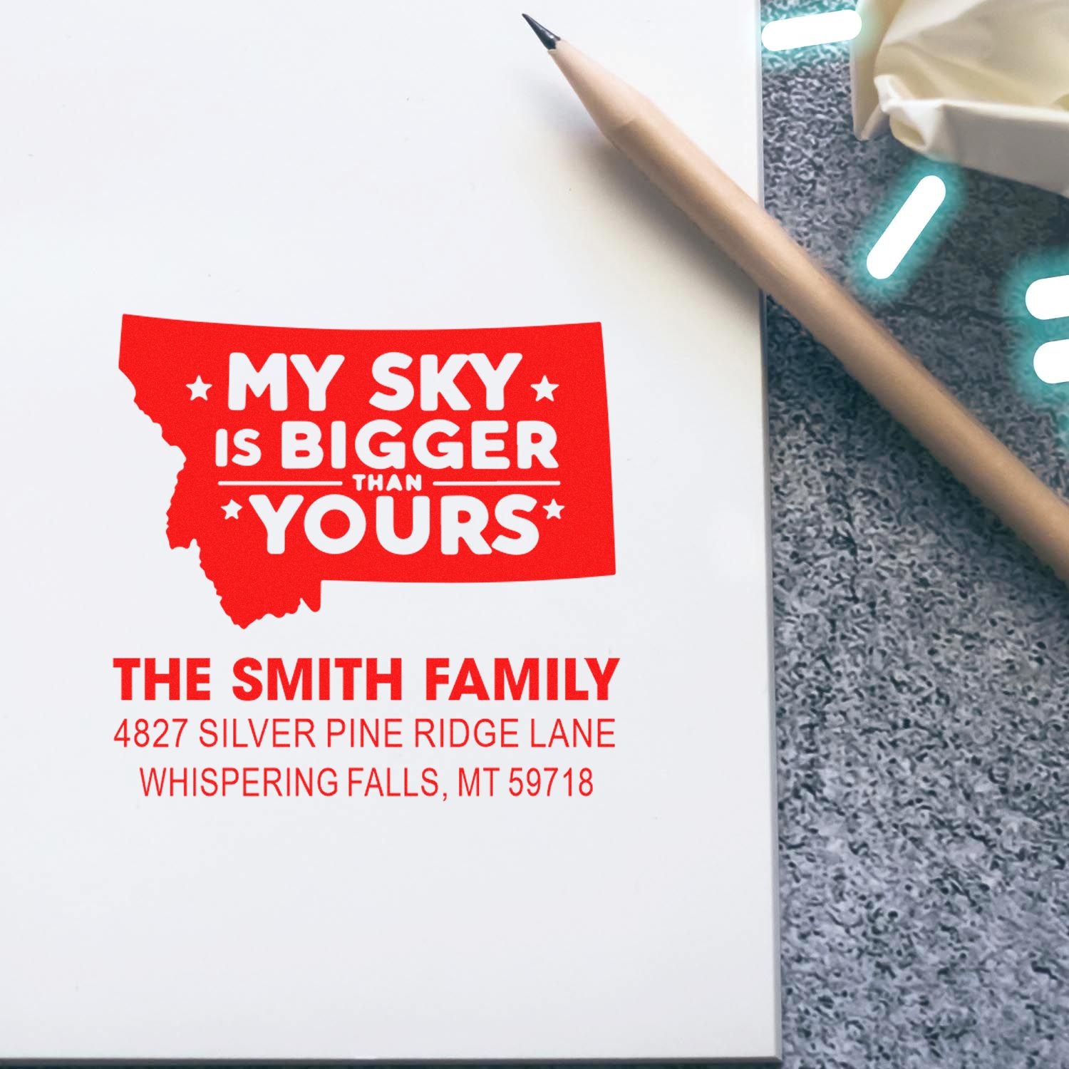 Personalized Montana custom address rubber stamp with family name, address and bold slogan for mailing.