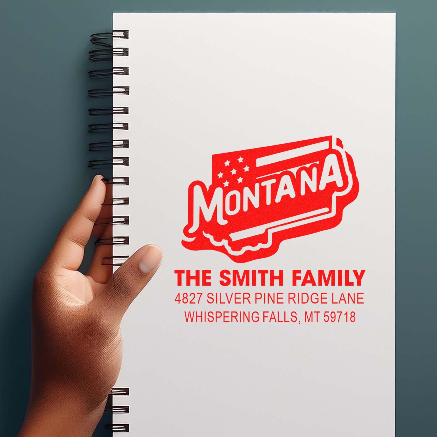 Custom Montana rubber stamp with family name and address, ideal for personalized mail, stationery, and return address labeling.