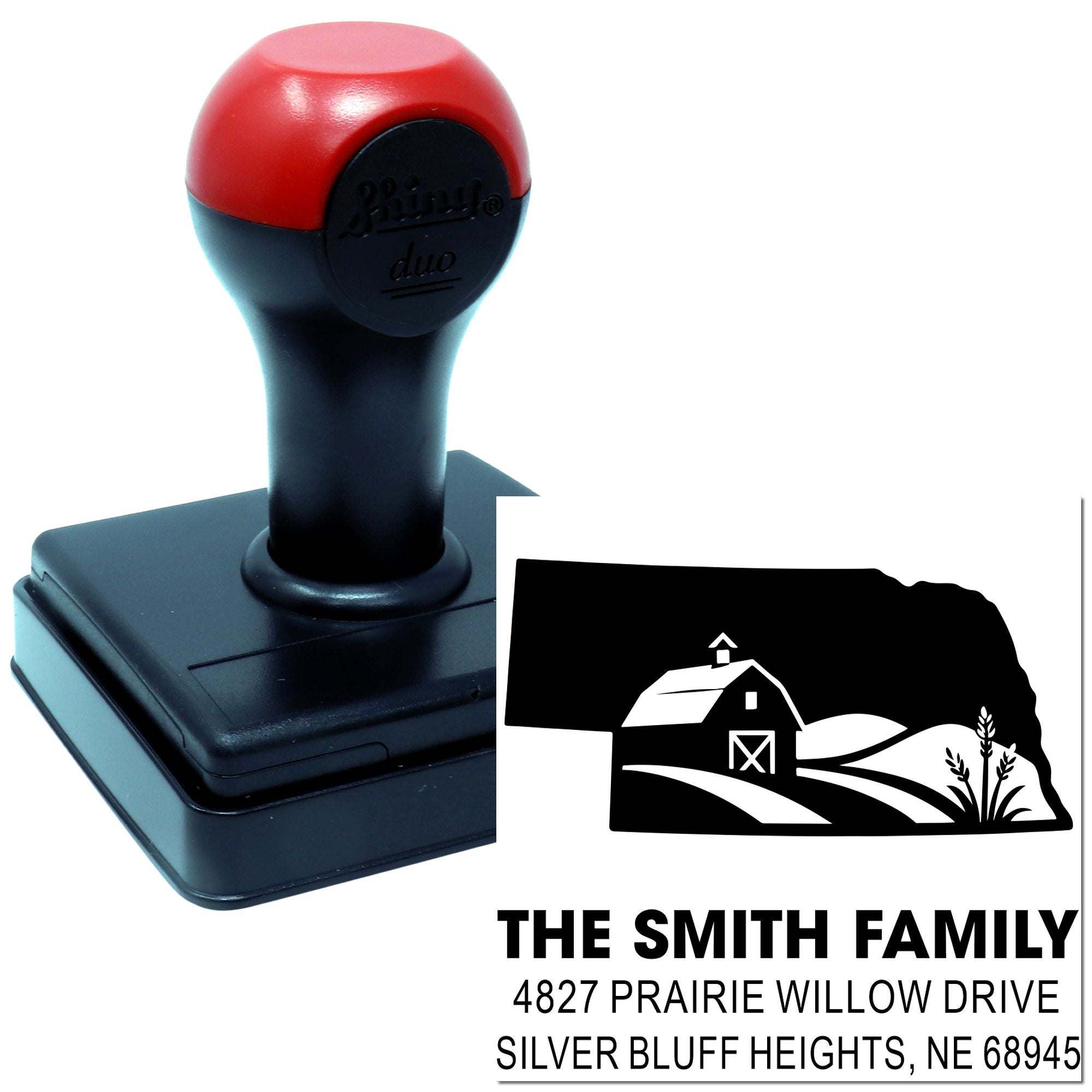 Custom self-inking rubber address stamp with barn graphic for The Smith Family return addresses.