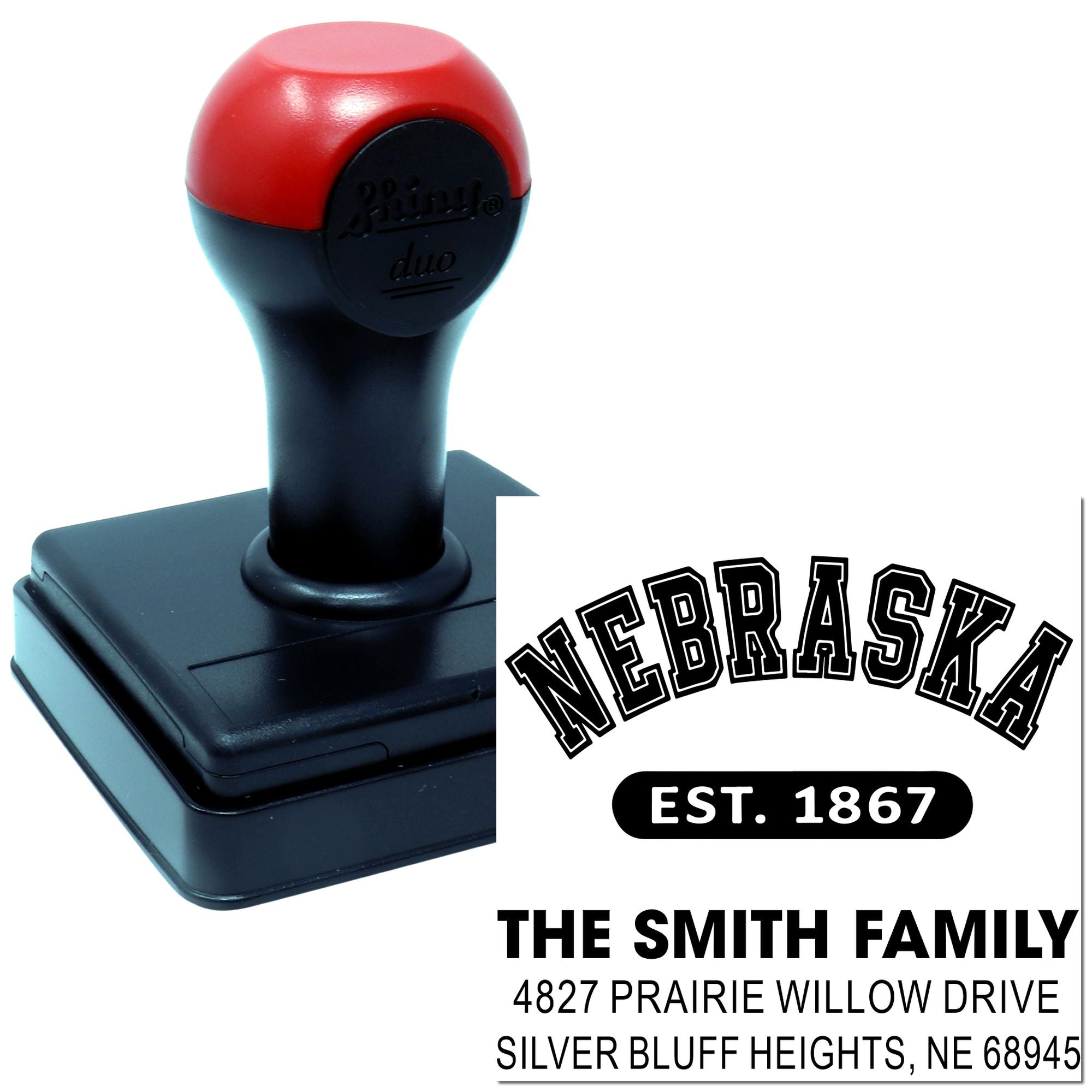 Personalized self-inking return address rubber stamp with Nebraska family name and custom mail imprint.
