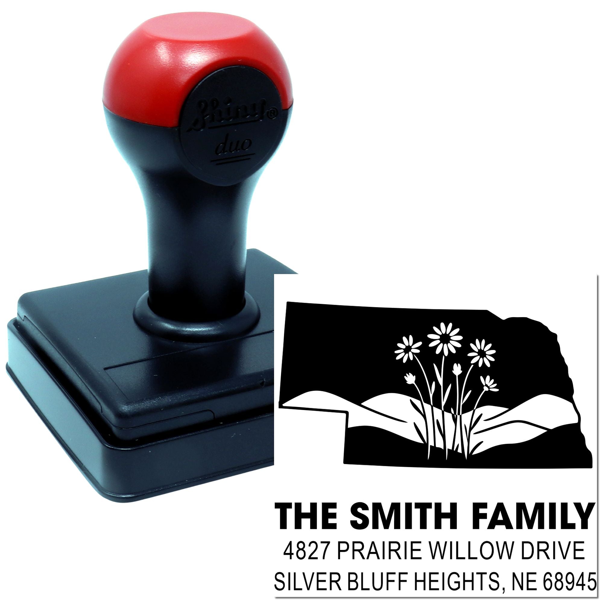 Custom self-inking rubber stamp with floral return address imprint for The Smith Family.