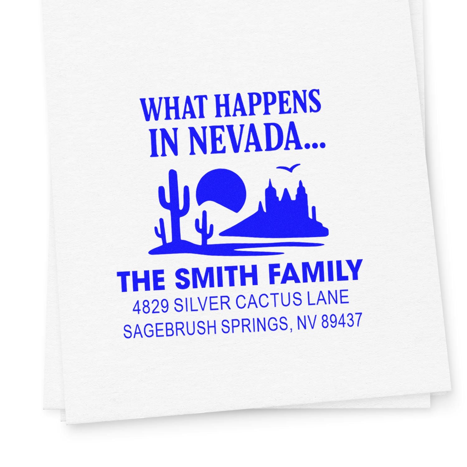 Custom Nevada return address rubber stamp with desert graphic, Smith family name, and blue ink text.